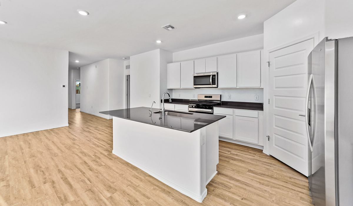 Step into The Dalea at Barnett Village, Marana, Arizona – a perfect blend of comfort, modern living, and energy efficiency. This thoughtfully crafted one-story home spans 2,224 square feet and offers five bedrooms and 3 bathrooms, ideal for families of all sizes.  The open-concept design features a spacious great room that effortlessly connects with the kitchen and dining area, creating an inviting central hub for everyday living and entertaining. The kitchen is equipped with contemporary appliances and a pantry, offering ample storage and convenience for meal preparation.  The primary bedroom, located at the rear of the home, provides a peaceful retreat with a private ensuite bathroom and a generous walk-in closet. The additional four bedrooms are positioned at the front of the house, offering versatility for use as guest rooms, a home office, or children’s bedrooms.  The Dalea floor plan offers the option of a three-car tandem garage, perfect for additional space and larger sized vehicles. Whether it’s morning coffee or evening relaxation, this outdoor space extends your living area into the serene landscape of Barnett Village.  Built with energy efficiency as a priority, the Dalea includes smart home technology, which not only simplifies daily living but also helps reduce utility costs.