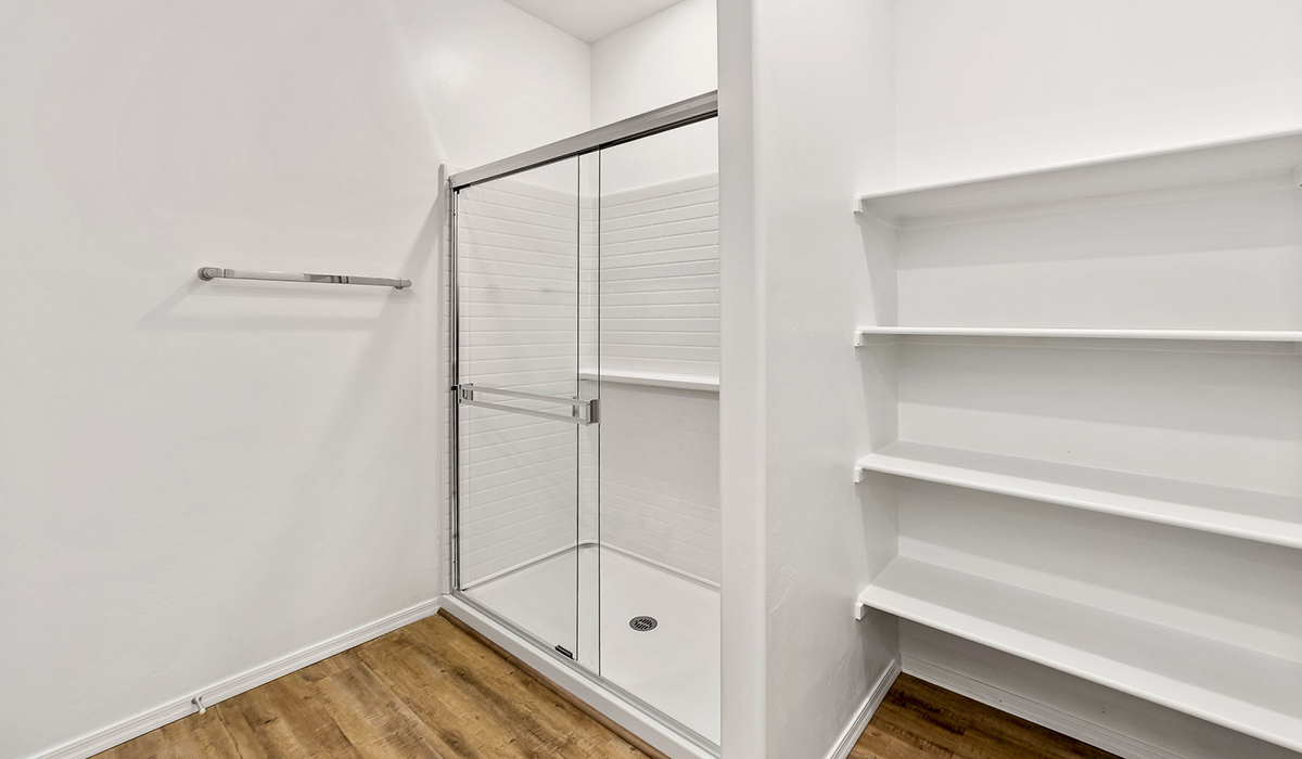 Step into The Dalea at Barnett Village, Marana, Arizona – a perfect blend of comfort, modern living, and energy efficiency. This thoughtfully crafted one-story home spans 2,224 square feet and offers five bedrooms and 3 bathrooms, ideal for families of all sizes.  The open-concept design features a spacious great room that effortlessly connects with the kitchen and dining area, creating an inviting central hub for everyday living and entertaining. The kitchen is equipped with contemporary appliances and a pantry, offering ample storage and convenience for meal preparation.  The primary bedroom, located at the rear of the home, provides a peaceful retreat with a private ensuite bathroom and a generous walk-in closet. The additional four bedrooms are positioned at the front of the house, offering versatility for use as guest rooms, a home office, or children’s bedrooms.  The Dalea floor plan offers the option of a three-car tandem garage, perfect for additional space and larger sized vehicles. Whether it’s morning coffee or evening relaxation, this outdoor space extends your living area into the serene landscape of Barnett Village.  Built with energy efficiency as a priority, the Dalea includes smart home technology, which not only simplifies daily living but also helps reduce utility costs.