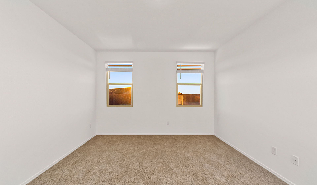 Step into The Dalea at Barnett Village, Marana, Arizona – a perfect blend of comfort, modern living, and energy efficiency. This thoughtfully crafted one-story home spans 2,224 square feet and offers five bedrooms and 3 bathrooms, ideal for families of all sizes.  The open-concept design features a spacious great room that effortlessly connects with the kitchen and dining area, creating an inviting central hub for everyday living and entertaining. The kitchen is equipped with contemporary appliances and a pantry, offering ample storage and convenience for meal preparation.  The primary bedroom, located at the rear of the home, provides a peaceful retreat with a private ensuite bathroom and a generous walk-in closet. The additional four bedrooms are positioned at the front of the house, offering versatility for use as guest rooms, a home office, or children’s bedrooms.  The Dalea floor plan offers the option of a three-car tandem garage, perfect for additional space and larger sized vehicles. Whether it’s morning coffee or evening relaxation, this outdoor space extends your living area into the serene landscape of Barnett Village.  Built with energy efficiency as a priority, the Dalea includes smart home technology, which not only simplifies daily living but also helps reduce utility costs.