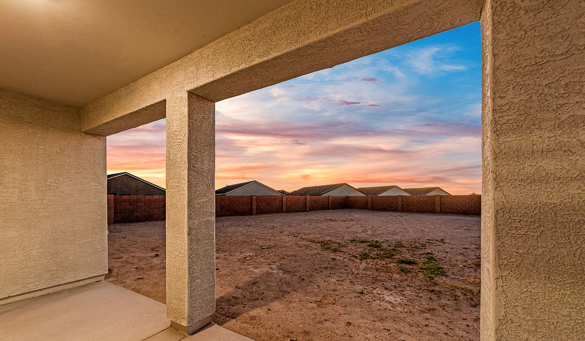 Step into The Dalea at Barnett Village, Marana, Arizona – a perfect blend of comfort, modern living, and energy efficiency. This thoughtfully crafted one-story home spans 2,224 square feet and offers five bedrooms and 3 bathrooms, ideal for families of all sizes.  The open-concept design features a spacious great room that effortlessly connects with the kitchen and dining area, creating an inviting central hub for everyday living and entertaining. The kitchen is equipped with contemporary appliances and a pantry, offering ample storage and convenience for meal preparation.  The primary bedroom, located at the rear of the home, provides a peaceful retreat with a private ensuite bathroom and a generous walk-in closet. The additional four bedrooms are positioned at the front of the house, offering versatility for use as guest rooms, a home office, or children’s bedrooms.  The Dalea floor plan offers the option of a three-car tandem garage, perfect for additional space and larger sized vehicles. Whether it’s morning coffee or evening relaxation, this outdoor space extends your living area into the serene landscape of Barnett Village.  Built with energy efficiency as a priority, the Dalea includes smart home technology, which not only simplifies daily living but also helps reduce utility costs.