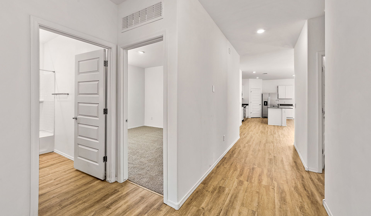 Step into The Dalea at Barnett Village, Marana, Arizona – a perfect blend of comfort, modern living, and energy efficiency. This thoughtfully crafted one-story home spans 2,224 square feet and offers five bedrooms and 3 bathrooms, ideal for families of all sizes.  The open-concept design features a spacious great room that effortlessly connects with the kitchen and dining area, creating an inviting central hub for everyday living and entertaining. The kitchen is equipped with contemporary appliances and a pantry, offering ample storage and convenience for meal preparation.  The primary bedroom, located at the rear of the home, provides a peaceful retreat with a private ensuite bathroom and a generous walk-in closet. The additional four bedrooms are positioned at the front of the house, offering versatility for use as guest rooms, a home office, or children’s bedrooms.  The Dalea floor plan offers the option of a three-car tandem garage, perfect for additional space and larger sized vehicles. Whether it’s morning coffee or evening relaxation, this outdoor space extends your living area into the serene landscape of Barnett Village.  Built with energy efficiency as a priority, the Dalea includes smart home technology, which not only simplifies daily living but also helps reduce utility costs.