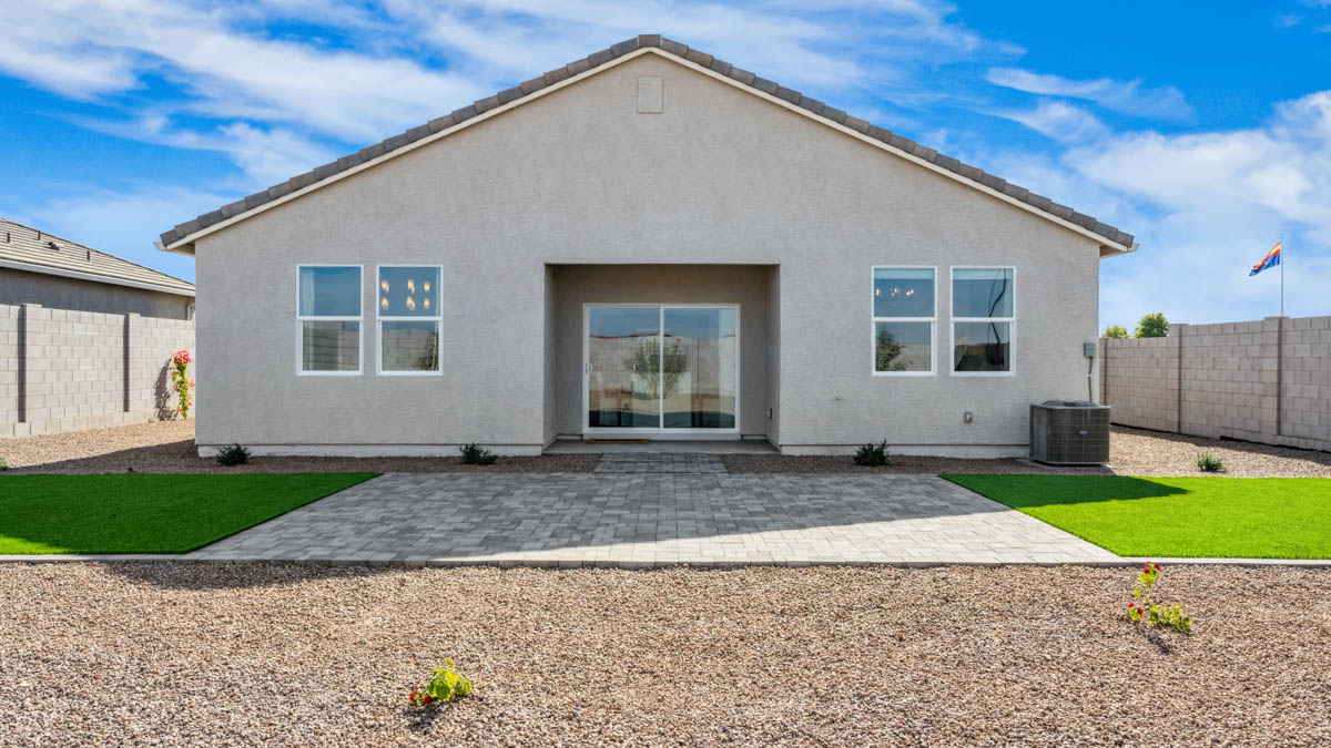 Explore The Dalton at Barnett Village in Marana, Arizona – a spacious 1,569 sq. ft. single-story new home designed to accommodate both comfort and convenience for modern living.  As you step through the front porch and into the welcoming entryway, you're immediately led into a thoughtfully designed space that maximizes every square foot. To the left, you’ll find Bedroom 4, ideal for guests or a home office, offering privacy and easy access to the main living areas.  Continuing through the home, you’ll enter the heart of The Dalton – an expansive great room that seamlessly connects to the dining area and kitchen. This open-concept space is perfect for entertaining or everyday family living, allowing for a fluid transition from cooking to dining to relaxation. The kitchen is equipped with sleek granite countertops, modern appliances, a walk-in pantry, and an island that doubles as a breakfast bar, providing ample space for meal prep and casual dining.  Adjacent to the great room, a hallway leads to three additional bedrooms, including the spacious master suite. The master bedroom offers a serene retreat with a large walk-in closet and an en-suite bathroom featuring dual vanities and a walk-in shower. The two secondary bedrooms share a well-appointed full bathroom, making it convenient for family members or guests.  The Dalton also includes a utility room that adds functionality and storage options to the home, as well as direct access to a two-car garage.  Step outside from the great room to the covered patio – a perfect spot to enjoy Arizona’s beautiful weather year-round, whether you’re sipping your morning coffee or hosting an evening barbecue.  Designed with energy efficiency in mind, The Dalton at Barnett Village is DOE Zero Energy Ready Home certified, ensuring long-term savings and a comfortable living environment.  *Images shown are for reference only. They depict the Dalton model home and may not represent the actual home.