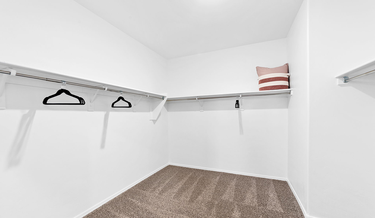 Welcome to The Harris at Barnett Village in Marana, Arizona – our beautifully designed home, offering 1,856 sq. ft. of modern living space that combines elegance with functionality.  Step through the inviting front porch and into a thoughtfully planned interior that begins with a welcoming entryway. This home features two of the four bedrooms near the entrance of the home, both sharing easy access to a full bathroom. These rooms are perfect for guests, children, or even a home office, providing comfort for various lifestyle needs.  As you continue through the spacious great room is revealed, the central hub of the home that seamlessly connects to the dining area and kitchen. The kitchen is a chef’s delight, complete with quartz countertops, large island with a breakfast bar, walk-in pantry, and state-of-the-art appliances.  Adjacent to the great room, a private hallway leads to the primary suite – a tranquil retreat within the home. The primary bedroom features a large walk-in closet and en-suite bathroom. Additionally, the suite offers direct access to a powder room, enhancing the convenience and privacy of this luxurious space.  The Harris also includes a utility room and a two-car garage adding to the home’s practical features, ensuring that daily routines are smooth and efficient.  Step outside to the covered patio, where you can unwind and take in the scenic beauty of Barnett Village. Whether you’re enjoying a quiet morning coffee or hosting a lively evening gathering, this outdoor space extends your living area and provides the perfect backdrop for Arizona’s desert landscapes.  Designed with energy efficiency, The Harris at Barnett Village is DOE Zero Energy Ready Home certified.  *Images shown are for reference only. They depict the sales model home and may not represent the actual home.