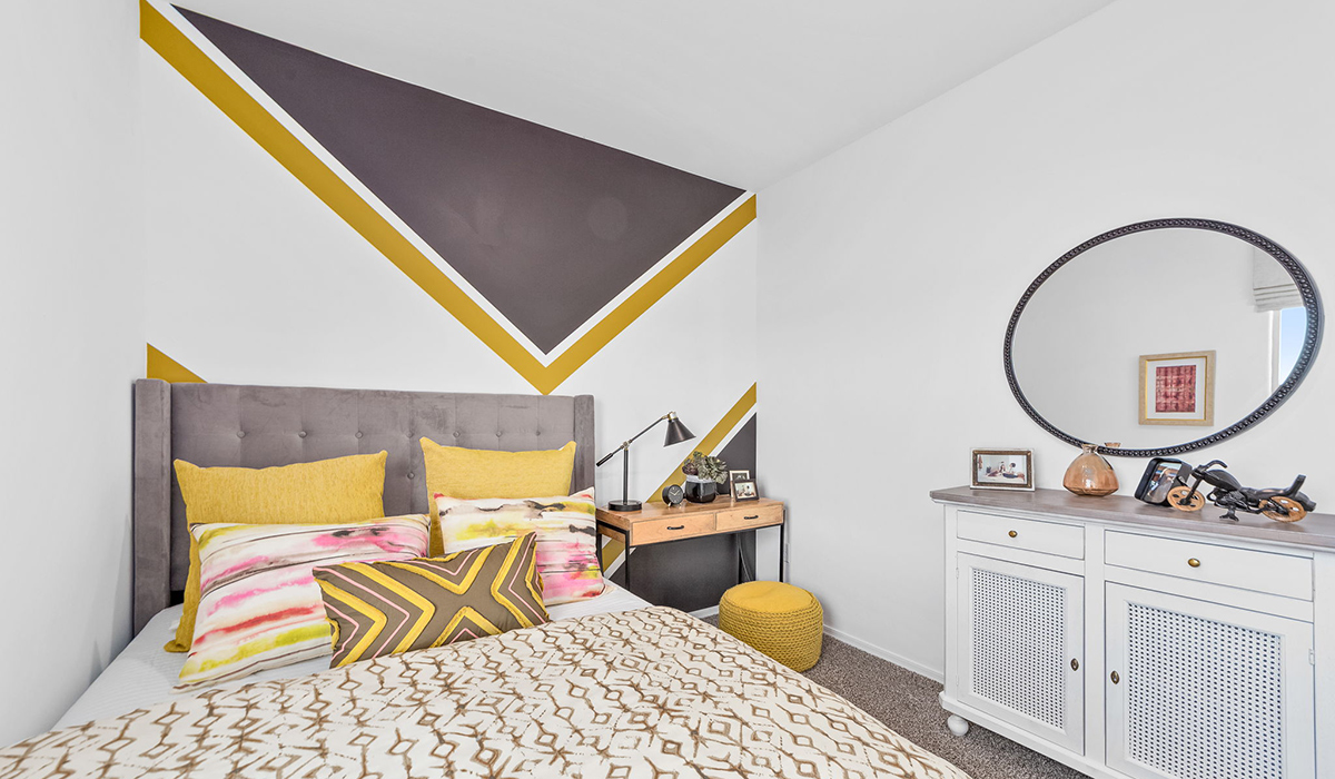 Welcome to The Harris at Barnett Village in Marana, Arizona – our beautifully designed home, offering 1,856 sq. ft. of modern living space that combines elegance with functionality.  Step through the inviting front porch and into a thoughtfully planned interior that begins with a welcoming entryway. This home features two of the four bedrooms near the entrance of the home, both sharing easy access to a full bathroom. These rooms are perfect for guests, children, or even a home office, providing comfort for various lifestyle needs.  As you continue through the spacious great room is revealed, the central hub of the home that seamlessly connects to the dining area and kitchen. The kitchen is a chef’s delight, complete with quartz countertops, large island with a breakfast bar, walk-in pantry, and state-of-the-art appliances.  Adjacent to the great room, a private hallway leads to the primary suite – a tranquil retreat within the home. The primary bedroom features a large walk-in closet and en-suite bathroom. Additionally, the suite offers direct access to a powder room, enhancing the convenience and privacy of this luxurious space.  The Harris also includes a utility room and a two-car garage adding to the home’s practical features, ensuring that daily routines are smooth and efficient.  Step outside to the covered patio, where you can unwind and take in the scenic beauty of Barnett Village. Whether you’re enjoying a quiet morning coffee or hosting a lively evening gathering, this outdoor space extends your living area and provides the perfect backdrop for Arizona’s desert landscapes.  Designed with energy efficiency, The Harris at Barnett Village is DOE Zero Energy Ready Home certified.  *Images shown are for reference only. They depict the sales model home and may not represent the actual home.