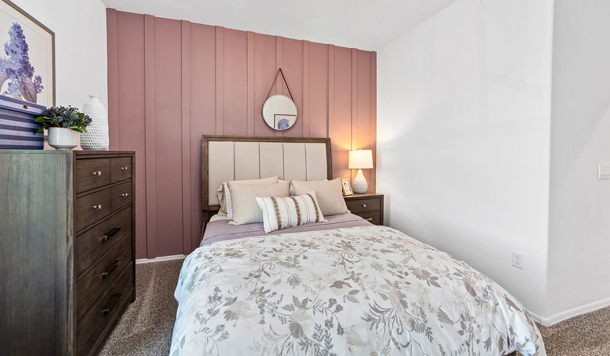 Welcome to The Harris at Barnett Village in Marana, Arizona – our beautifully designed home, offering 1,856 sq. ft. of modern living space that combines elegance with functionality.  Step through the inviting front porch and into a thoughtfully planned interior that begins with a welcoming entryway. This home features two of the four bedrooms near the entrance of the home, both sharing easy access to a full bathroom. These rooms are perfect for guests, children, or even a home office, providing comfort for various lifestyle needs.  As you continue through the spacious great room is revealed, the central hub of the home that seamlessly connects to the dining area and kitchen. The kitchen is a chef’s delight, complete with quartz countertops, large island with a breakfast bar, walk-in pantry, and state-of-the-art appliances.  Adjacent to the great room, a private hallway leads to the primary suite – a tranquil retreat within the home. The primary bedroom features a large walk-in closet and en-suite bathroom. Additionally, the suite offers direct access to a powder room, enhancing the convenience and privacy of this luxurious space.  The Harris also includes a utility room and a two-car garage adding to the home’s practical features, ensuring that daily routines are smooth and efficient.  Step outside to the covered patio, where you can unwind and take in the scenic beauty of Barnett Village. Whether you’re enjoying a quiet morning coffee or hosting a lively evening gathering, this outdoor space extends your living area and provides the perfect backdrop for Arizona’s desert landscapes.  Designed with energy efficiency, The Harris at Barnett Village is DOE Zero Energy Ready Home certified.  *Images shown are for reference only. They depict the sales model home and may not represent the actual home.