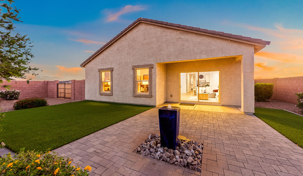 Welcome to The Harris at Barnett Village in Marana, Arizona – our beautifully designed home, offering 1,856 sq. ft. of modern living space that combines elegance with functionality.  Step through the inviting front porch and into a thoughtfully planned interior that begins with a welcoming entryway. This home features two of the four bedrooms near the entrance of the home, both sharing easy access to a full bathroom. These rooms are perfect for guests, children, or even a home office, providing comfort for various lifestyle needs.  As you continue through the spacious great room is revealed, the central hub of the home that seamlessly connects to the dining area and kitchen. The kitchen is a chef’s delight, complete with quartz countertops, large island with a breakfast bar, walk-in pantry, and state-of-the-art appliances.  Adjacent to the great room, a private hallway leads to the primary suite – a tranquil retreat within the home. The primary bedroom features a large walk-in closet and en-suite bathroom. Additionally, the suite offers direct access to a powder room, enhancing the convenience and privacy of this luxurious space.  The Harris also includes a utility room and a two-car garage adding to the home’s practical features, ensuring that daily routines are smooth and efficient.  Step outside to the covered patio, where you can unwind and take in the scenic beauty of Barnett Village. Whether you’re enjoying a quiet morning coffee or hosting a lively evening gathering, this outdoor space extends your living area and provides the perfect backdrop for Arizona’s desert landscapes.  Designed with energy efficiency, The Harris at Barnett Village is DOE Zero Energy Ready Home certified.  *Images shown are for reference only. They depict the sales model home and may not represent the actual home.