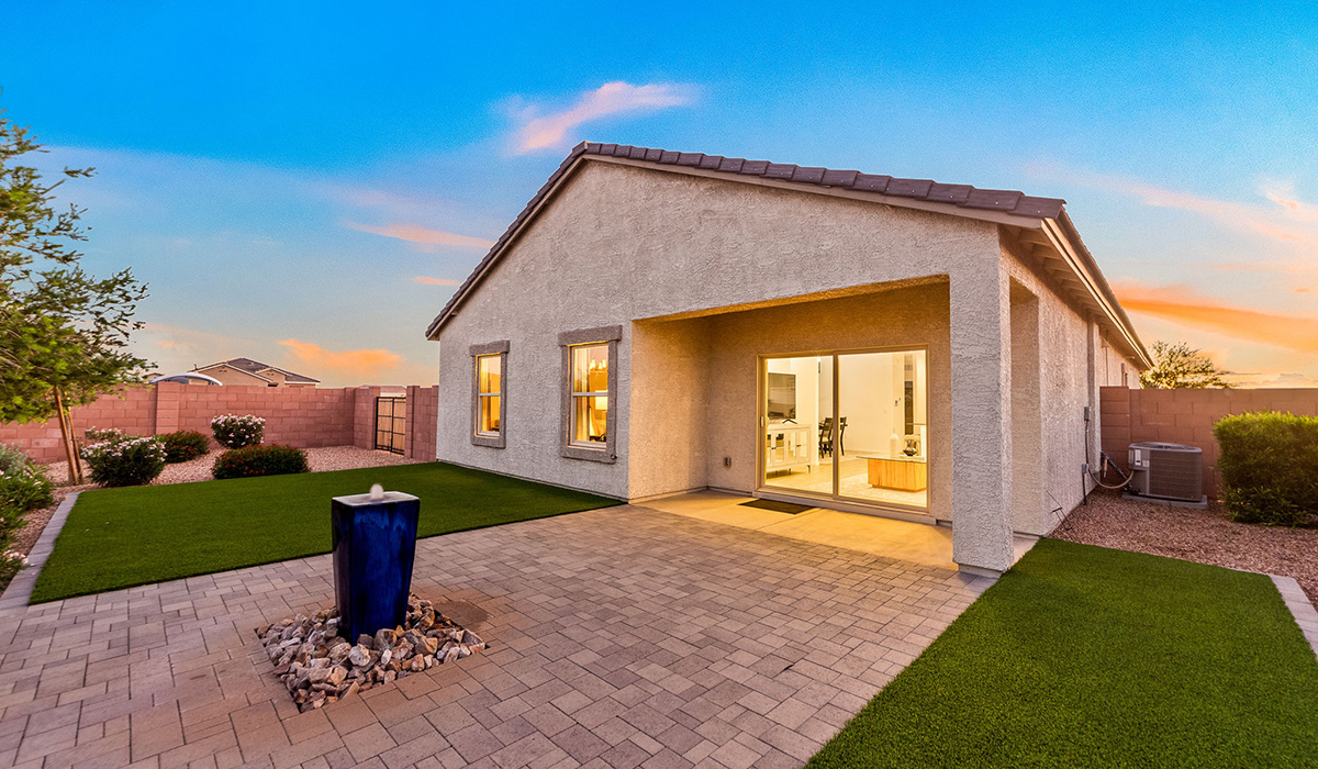 Welcome to The Harris at Barnett Village in Marana, Arizona – our beautifully designed home, offering 1,856 sq. ft. of modern living space that combines elegance with functionality.  Step through the inviting front porch and into a thoughtfully planned interior that begins with a welcoming entryway. This home features two of the four bedrooms near the entrance of the home, both sharing easy access to a full bathroom. These rooms are perfect for guests, children, or even a home office, providing comfort for various lifestyle needs.  As you continue through the spacious great room is revealed, the central hub of the home that seamlessly connects to the dining area and kitchen. The kitchen is a chef’s delight, complete with quartz countertops, large island with a breakfast bar, walk-in pantry, and state-of-the-art appliances.  Adjacent to the great room, a private hallway leads to the primary suite – a tranquil retreat within the home. The primary bedroom features a large walk-in closet and en-suite bathroom. Additionally, the suite offers direct access to a powder room, enhancing the convenience and privacy of this luxurious space.  The Harris also includes a utility room and a two-car garage adding to the home’s practical features, ensuring that daily routines are smooth and efficient.  Step outside to the covered patio, where you can unwind and take in the scenic beauty of Barnett Village. Whether you’re enjoying a quiet morning coffee or hosting a lively evening gathering, this outdoor space extends your living area and provides the perfect backdrop for Arizona’s desert landscapes.  Designed with energy efficiency, The Harris at Barnett Village is DOE Zero Energy Ready Home certified.  *Images shown are for reference only. They depict the sales model home and may not represent the actual home.