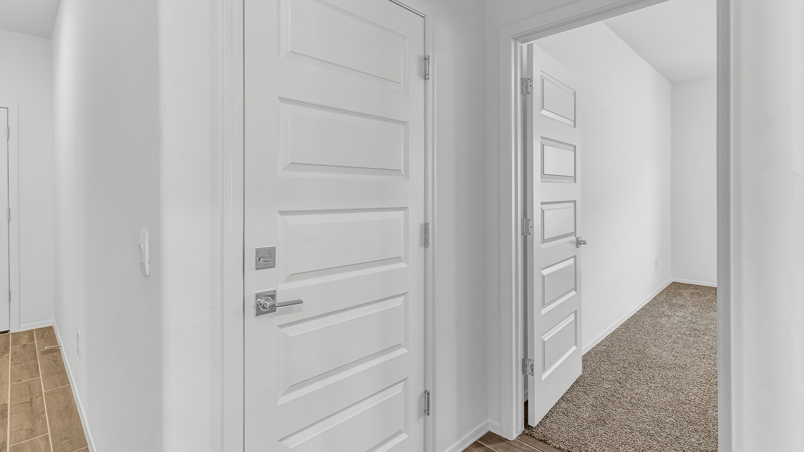 Step into The Cali at Barnett Village, Marana, Arizona – a perfect blend of comfort, modern living, and energy efficiency. This thoughtfully crafted one-story home spans 1,825 square feet and offers ample space featuring 4 bedrooms and 2 bathrooms, ideal for families of all sizes.  As you step through the front porch and into the welcoming entryway, you're immediately led into a thoughtfully designed space that maximizes every square foot. Near the entrance of the home you’ll find 2 bedrooms, ideal for guests or a home office, offering privacy and easy access to the main living areas.  Continuing through the home, you’ll enter the heart of The Cali – an expansive great room that seamlessly connects to the dining area and kitchen. This open-concept space is perfect for entertaining or everyday family living, allowing for a fluid transition from cooking to dining to relaxation. The kitchen is equipped with sleek quartz countertops, modern appliances, a pantry, and an island that doubles as a breakfast bar, providing ample space for meal prep and casual dining.  The primary bedroom, located at the rear of the home, provides a peaceful retreat with a private ensuite bathroom and a generous walk-in closet. The additional four bedrooms are positioned at the front of the house, offering versatility for use as guest rooms, a home office, or children’s bedrooms.  The Cali floor plan offers the option of an extended covered back patio. Whether it’s morning coffee or evening relaxation, this outdoor space extends your living area into the serene landscape of Barnett Village.  Designed with energy efficiency in mind, The Cali at Barnett Village is DOE Zero Energy Ready Home certified, ensuring long-term savings and a comfortable living environment.