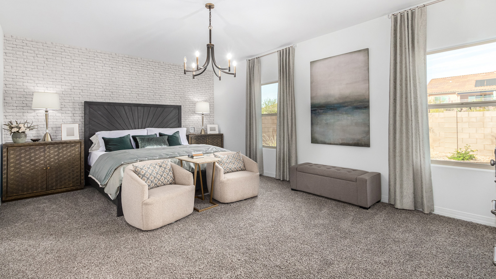 Step into The Kingston at Barnett Village, Marana, Arizona – a perfect blend of comfort, modern living, and energy efficiency. This thoughtfully crafted one-story home spans 2,068 square feet and offers four bedrooms and two bathrooms, ideal for families of all sizes.  The open-concept design features a spacious great room that effortlessly connects with the kitchen and dining area, creating an inviting central hub for everyday living and entertaining. The kitchen is equipped with contemporary appliances and a pantry, offering ample storage and convenience for meal preparation.  The primary bedroom, located at the rear of the home, provides a peaceful retreat with a private ensuite bathroom and a generous walk-in closet. The additional three bedrooms are positioned at the front of the house, offering versatility for use as guest rooms, a home office, or children’s bedrooms. Step outside to the covered patio, a perfect spot to enjoy the beautiful Arizona weather, whether for morning coffee or evening relaxation.  The Kingston also boasts a covered patio, perfect for enjoying Arizona’s beautiful desert evenings. Whether it’s morning coffee or evening relaxation, this outdoor space extends your living area into the serene landscape of Barnett Village.  Built with energy efficiency as a priority, the Kingston includes smart home technology, which not only simplifies daily living but also helps reduce utility costs. A two-car garage provides ample parking and additional storage space, enhancing the home’s functionality.