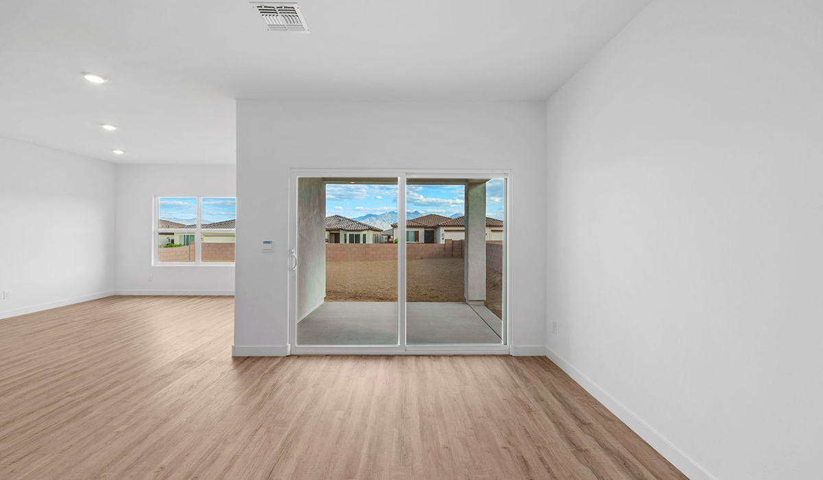 Introducing the York — a thoughtfully designed new floor plan at Solterra by D.R. Horton in Green Valley. Offering 1,863 square feet of well-planned living space, the York is ideal for those seeking a home that balances comfort, flexibility, and modern design.  Step inside through the welcoming entryway and experience an open-concept layout that maximizes every square foot. The expansive great room serves as the heart of the home, flowing seamlessly into the dining area and kitchen, perfect for both everyday living and entertaining. The kitchen features a spacious center island, quartz countertops, Shaker-style cabinetry, and a dedicated pantry, delivering a clean, modern aesthetic with ample storage for all your culinary essentials.  The York is available in two- and three-bedroom configurations, offering flexibility to meet a variety of lifestyle needs. The primary suite is thoughtfully located at the rear of the home for added privacy and includes a linen closet, walk-in closet, and a well-appointed ensuite bathroom. Near the front of the home is a powder room, guest bedroom with walk-in closet and ensuite bathroom, and study that creates a functional layout for guests, work-from-home needs, or additional living space.  Designed with both comfort and practicality in mind, the York includes a utility room conveniently located near the kitchen and garage, providing easy access to the laundry area and additional storage. A covered back patio extends the living space outdoors—ideal for relaxing and enjoying Green Valley’s beautiful year-round weather.  Homes at Solterra feature elegant, modern interiors paired with distinctive exterior details, including sand finish texture stucco, landscaped front yards with auto drip irrigation, and fully fenced backyards. Covered back patios offer inviting spaces to unwind and take in Green Valley’s breathtaking sunsets. Inside, D.R. Horton’s Home is Connected® Smart Home package enhances everyday living with a smart thermostat, video doorbell, keyless entry, and a Wi-Fi–enabled garage door opener.  Outdoor enthusiasts will appreciate the close proximity to scenic neighborhood parks, Colossal Cave Mountain Park, and an extensive network of walking and biking trails throughout Green Valley—making the York a perfect blend of comfort, style, and lifestyle-driven design.