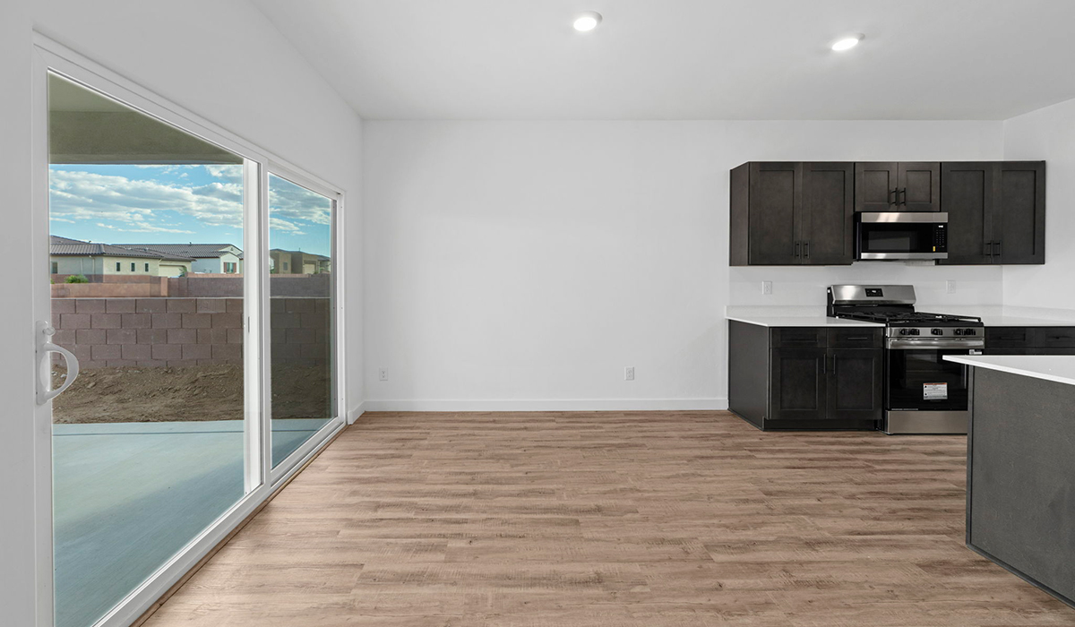 Introducing the York — a thoughtfully designed new floor plan at Solterra by D.R. Horton in Green Valley. Offering 1,863 square feet of well-planned living space, the York is ideal for those seeking a home that balances comfort, flexibility, and modern design.  Step inside through the welcoming entryway and experience an open-concept layout that maximizes every square foot. The expansive great room serves as the heart of the home, flowing seamlessly into the dining area and kitchen, perfect for both everyday living and entertaining. The kitchen features a spacious center island, quartz countertops, Shaker-style cabinetry, and a dedicated pantry, delivering a clean, modern aesthetic with ample storage for all your culinary essentials.  The York is available in two- and three-bedroom configurations, offering flexibility to meet a variety of lifestyle needs. The primary suite is thoughtfully located at the rear of the home for added privacy and includes a linen closet, walk-in closet, and a well-appointed ensuite bathroom. Near the front of the home is a powder room, guest bedroom with walk-in closet and ensuite bathroom, and study that creates a functional layout for guests, work-from-home needs, or additional living space.  Designed with both comfort and practicality in mind, the York includes a utility room conveniently located near the kitchen and garage, providing easy access to the laundry area and additional storage. A covered back patio extends the living space outdoors—ideal for relaxing and enjoying Green Valley’s beautiful year-round weather.  Homes at Solterra feature elegant, modern interiors paired with distinctive exterior details, including sand finish texture stucco, landscaped front yards with auto drip irrigation, and fully fenced backyards. Covered back patios offer inviting spaces to unwind and take in Green Valley’s breathtaking sunsets. Inside, D.R. Horton’s Home is Connected® Smart Home package enhances everyday living with a smart thermostat, video doorbell, keyless entry, and a Wi-Fi–enabled garage door opener.  Outdoor enthusiasts will appreciate the close proximity to scenic neighborhood parks, Colossal Cave Mountain Park, and an extensive network of walking and biking trails throughout Green Valley—making the York a perfect blend of comfort, style, and lifestyle-driven design.