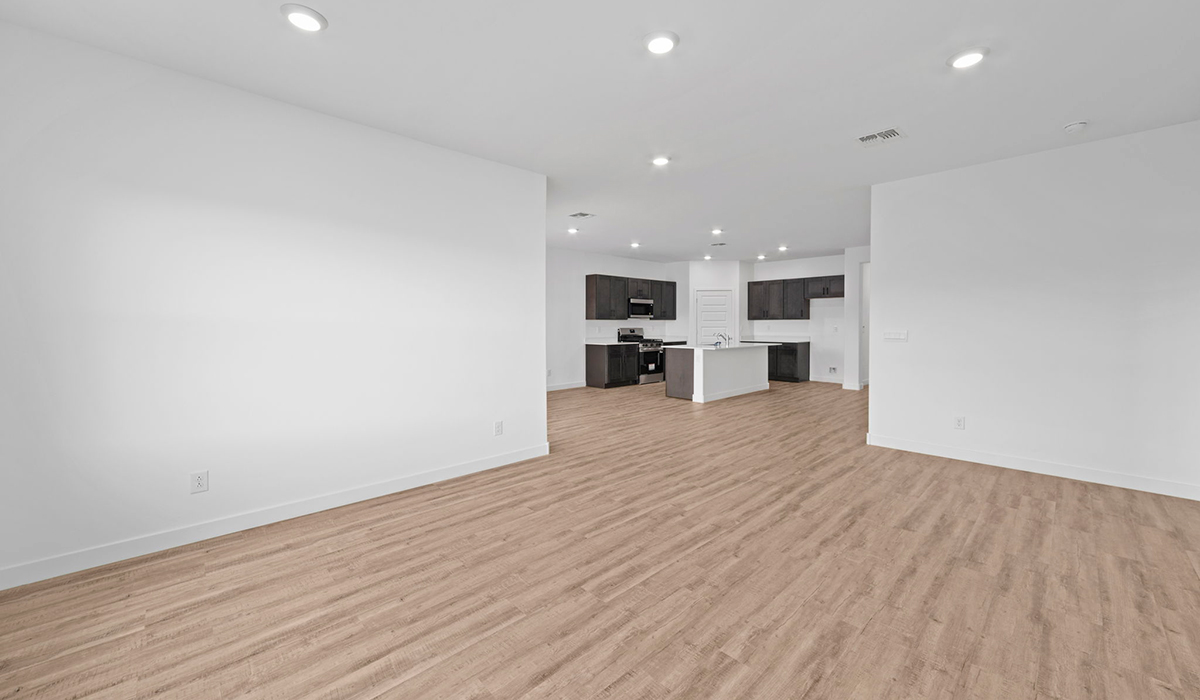 Introducing the York — a thoughtfully designed new floor plan at Solterra by D.R. Horton in Green Valley. Offering 1,863 square feet of well-planned living space, the York is ideal for those seeking a home that balances comfort, flexibility, and modern design.  Step inside through the welcoming entryway and experience an open-concept layout that maximizes every square foot. The expansive great room serves as the heart of the home, flowing seamlessly into the dining area and kitchen, perfect for both everyday living and entertaining. The kitchen features a spacious center island, quartz countertops, Shaker-style cabinetry, and a dedicated pantry, delivering a clean, modern aesthetic with ample storage for all your culinary essentials.  The York is available in two- and three-bedroom configurations, offering flexibility to meet a variety of lifestyle needs. The primary suite is thoughtfully located at the rear of the home for added privacy and includes a linen closet, walk-in closet, and a well-appointed ensuite bathroom. Near the front of the home is a powder room, guest bedroom with walk-in closet and ensuite bathroom, and study that creates a functional layout for guests, work-from-home needs, or additional living space.  Designed with both comfort and practicality in mind, the York includes a utility room conveniently located near the kitchen and garage, providing easy access to the laundry area and additional storage. A covered back patio extends the living space outdoors—ideal for relaxing and enjoying Green Valley’s beautiful year-round weather.  Homes at Solterra feature elegant, modern interiors paired with distinctive exterior details, including sand finish texture stucco, landscaped front yards with auto drip irrigation, and fully fenced backyards. Covered back patios offer inviting spaces to unwind and take in Green Valley’s breathtaking sunsets. Inside, D.R. Horton’s Home is Connected® Smart Home package enhances everyday living with a smart thermostat, video doorbell, keyless entry, and a Wi-Fi–enabled garage door opener.  Outdoor enthusiasts will appreciate the close proximity to scenic neighborhood parks, Colossal Cave Mountain Park, and an extensive network of walking and biking trails throughout Green Valley—making the York a perfect blend of comfort, style, and lifestyle-driven design.