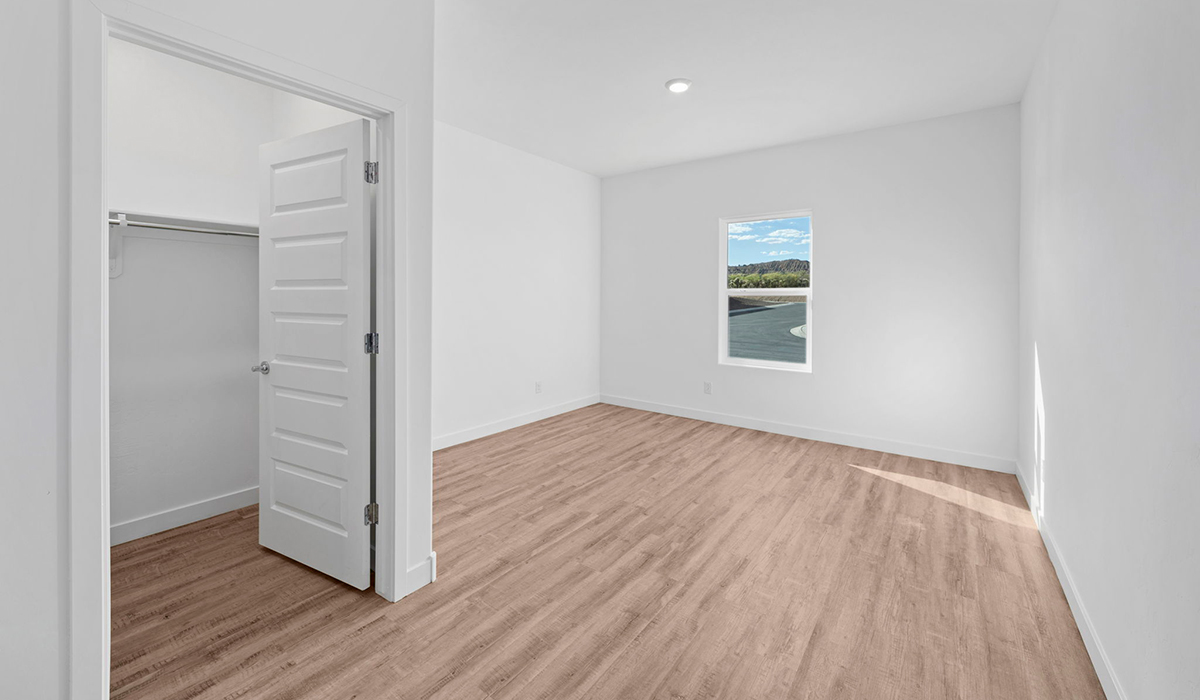 Introducing the York — a thoughtfully designed new floor plan at Solterra by D.R. Horton in Green Valley. Offering 1,863 square feet of well-planned living space, the York is ideal for those seeking a home that balances comfort, flexibility, and modern design.  Step inside through the welcoming entryway and experience an open-concept layout that maximizes every square foot. The expansive great room serves as the heart of the home, flowing seamlessly into the dining area and kitchen, perfect for both everyday living and entertaining. The kitchen features a spacious center island, quartz countertops, Shaker-style cabinetry, and a dedicated pantry, delivering a clean, modern aesthetic with ample storage for all your culinary essentials.  The York is available in two- and three-bedroom configurations, offering flexibility to meet a variety of lifestyle needs. The primary suite is thoughtfully located at the rear of the home for added privacy and includes a linen closet, walk-in closet, and a well-appointed ensuite bathroom. Near the front of the home is a powder room, guest bedroom with walk-in closet and ensuite bathroom, and study that creates a functional layout for guests, work-from-home needs, or additional living space.  Designed with both comfort and practicality in mind, the York includes a utility room conveniently located near the kitchen and garage, providing easy access to the laundry area and additional storage. A covered back patio extends the living space outdoors—ideal for relaxing and enjoying Green Valley’s beautiful year-round weather.  Homes at Solterra feature elegant, modern interiors paired with distinctive exterior details, including sand finish texture stucco, landscaped front yards with auto drip irrigation, and fully fenced backyards. Covered back patios offer inviting spaces to unwind and take in Green Valley’s breathtaking sunsets. Inside, D.R. Horton’s Home is Connected® Smart Home package enhances everyday living with a smart thermostat, video doorbell, keyless entry, and a Wi-Fi–enabled garage door opener.  Outdoor enthusiasts will appreciate the close proximity to scenic neighborhood parks, Colossal Cave Mountain Park, and an extensive network of walking and biking trails throughout Green Valley—making the York a perfect blend of comfort, style, and lifestyle-driven design.