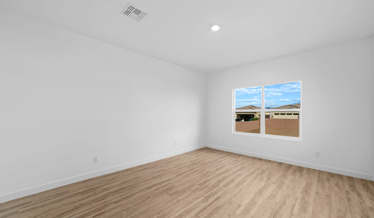 Introducing the York — a thoughtfully designed new floor plan at Solterra by D.R. Horton in Green Valley. Offering 1,863 square feet of well-planned living space, the York is ideal for those seeking a home that balances comfort, flexibility, and modern design.  Step inside through the welcoming entryway and experience an open-concept layout that maximizes every square foot. The expansive great room serves as the heart of the home, flowing seamlessly into the dining area and kitchen, perfect for both everyday living and entertaining. The kitchen features a spacious center island, quartz countertops, Shaker-style cabinetry, and a dedicated pantry, delivering a clean, modern aesthetic with ample storage for all your culinary essentials.  The York is available in two- and three-bedroom configurations, offering flexibility to meet a variety of lifestyle needs. The primary suite is thoughtfully located at the rear of the home for added privacy and includes a linen closet, walk-in closet, and a well-appointed ensuite bathroom. Near the front of the home is a powder room, guest bedroom with walk-in closet and ensuite bathroom, and study that creates a functional layout for guests, work-from-home needs, or additional living space.  Designed with both comfort and practicality in mind, the York includes a utility room conveniently located near the kitchen and garage, providing easy access to the laundry area and additional storage. A covered back patio extends the living space outdoors—ideal for relaxing and enjoying Green Valley’s beautiful year-round weather.  Homes at Solterra feature elegant, modern interiors paired with distinctive exterior details, including sand finish texture stucco, landscaped front yards with auto drip irrigation, and fully fenced backyards. Covered back patios offer inviting spaces to unwind and take in Green Valley’s breathtaking sunsets. Inside, D.R. Horton’s Home is Connected® Smart Home package enhances everyday living with a smart thermostat, video doorbell, keyless entry, and a Wi-Fi–enabled garage door opener.  Outdoor enthusiasts will appreciate the close proximity to scenic neighborhood parks, Colossal Cave Mountain Park, and an extensive network of walking and biking trails throughout Green Valley—making the York a perfect blend of comfort, style, and lifestyle-driven design.