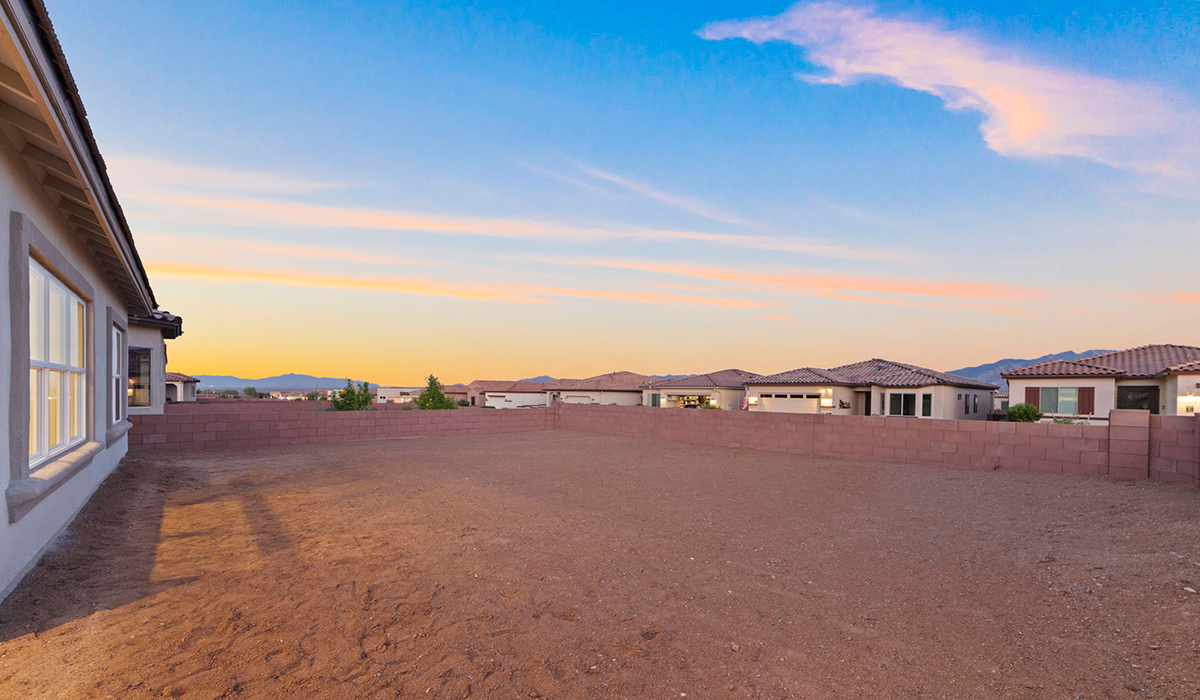 Introducing the York — a thoughtfully designed new floor plan at Solterra by D.R. Horton in Green Valley. Offering 1,863 square feet of well-planned living space, the York is ideal for those seeking a home that balances comfort, flexibility, and modern design.  Step inside through the welcoming entryway and experience an open-concept layout that maximizes every square foot. The expansive great room serves as the heart of the home, flowing seamlessly into the dining area and kitchen, perfect for both everyday living and entertaining. The kitchen features a spacious center island, quartz countertops, Shaker-style cabinetry, and a dedicated pantry, delivering a clean, modern aesthetic with ample storage for all your culinary essentials.  The York is available in two- and three-bedroom configurations, offering flexibility to meet a variety of lifestyle needs. The primary suite is thoughtfully located at the rear of the home for added privacy and includes a linen closet, walk-in closet, and a well-appointed ensuite bathroom. Near the front of the home is a powder room, guest bedroom with walk-in closet and ensuite bathroom, and study that creates a functional layout for guests, work-from-home needs, or additional living space.  Designed with both comfort and practicality in mind, the York includes a utility room conveniently located near the kitchen and garage, providing easy access to the laundry area and additional storage. A covered back patio extends the living space outdoors—ideal for relaxing and enjoying Green Valley’s beautiful year-round weather.  Homes at Solterra feature elegant, modern interiors paired with distinctive exterior details, including sand finish texture stucco, landscaped front yards with auto drip irrigation, and fully fenced backyards. Covered back patios offer inviting spaces to unwind and take in Green Valley’s breathtaking sunsets. Inside, D.R. Horton’s Home is Connected® Smart Home package enhances everyday living with a smart thermostat, video doorbell, keyless entry, and a Wi-Fi–enabled garage door opener.  Outdoor enthusiasts will appreciate the close proximity to scenic neighborhood parks, Colossal Cave Mountain Park, and an extensive network of walking and biking trails throughout Green Valley—making the York a perfect blend of comfort, style, and lifestyle-driven design.