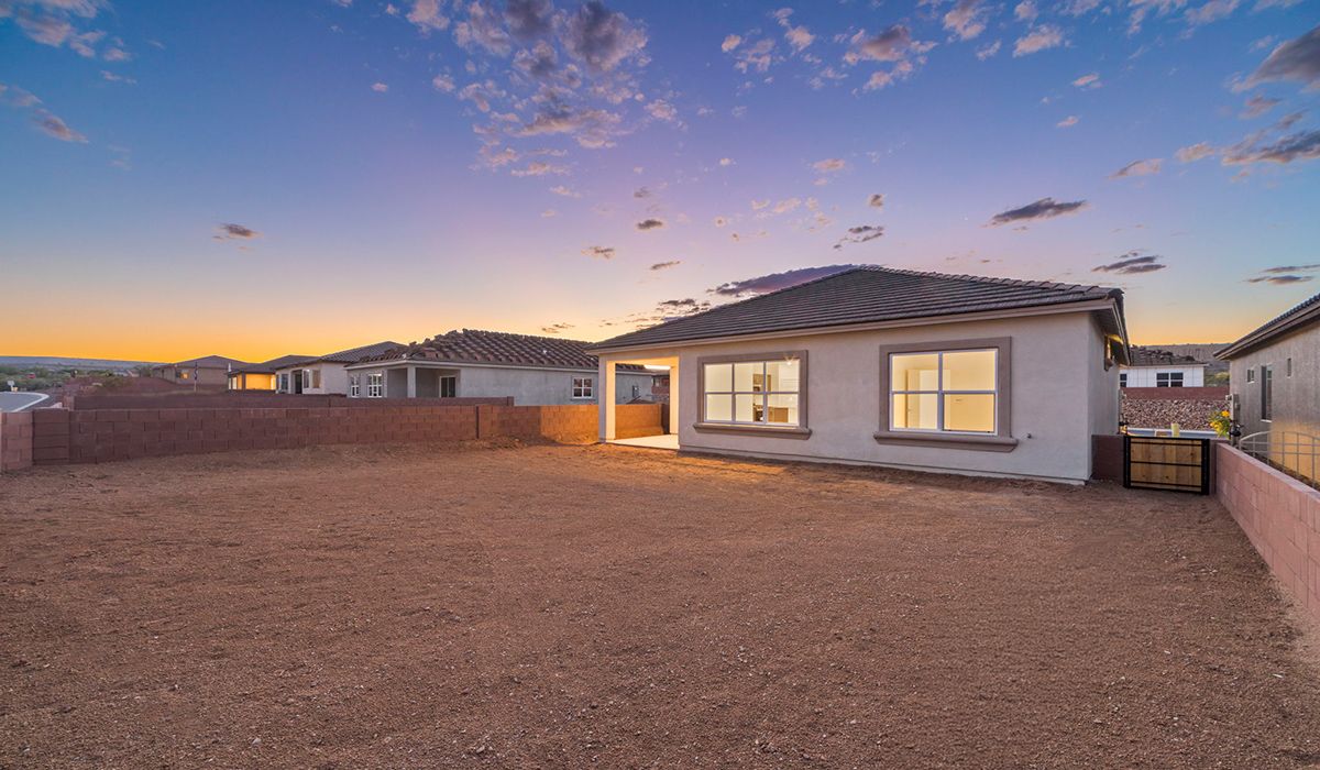 Introducing the York — a thoughtfully designed new floor plan at Solterra by D.R. Horton in Green Valley. Offering 1,863 square feet of well-planned living space, the York is ideal for those seeking a home that balances comfort, flexibility, and modern design.  Step inside through the welcoming entryway and experience an open-concept layout that maximizes every square foot. The expansive great room serves as the heart of the home, flowing seamlessly into the dining area and kitchen, perfect for both everyday living and entertaining. The kitchen features a spacious center island, quartz countertops, Shaker-style cabinetry, and a dedicated pantry, delivering a clean, modern aesthetic with ample storage for all your culinary essentials.  The York is available in two- and three-bedroom configurations, offering flexibility to meet a variety of lifestyle needs. The primary suite is thoughtfully located at the rear of the home for added privacy and includes a linen closet, walk-in closet, and a well-appointed ensuite bathroom. Near the front of the home is a powder room, guest bedroom with walk-in closet and ensuite bathroom, and study that creates a functional layout for guests, work-from-home needs, or additional living space.  Designed with both comfort and practicality in mind, the York includes a utility room conveniently located near the kitchen and garage, providing easy access to the laundry area and additional storage. A covered back patio extends the living space outdoors—ideal for relaxing and enjoying Green Valley’s beautiful year-round weather.  Homes at Solterra feature elegant, modern interiors paired with distinctive exterior details, including sand finish texture stucco, landscaped front yards with auto drip irrigation, and fully fenced backyards. Covered back patios offer inviting spaces to unwind and take in Green Valley’s breathtaking sunsets. Inside, D.R. Horton’s Home is Connected® Smart Home package enhances everyday living with a smart thermostat, video doorbell, keyless entry, and a Wi-Fi–enabled garage door opener.  Outdoor enthusiasts will appreciate the close proximity to scenic neighborhood parks, Colossal Cave Mountain Park, and an extensive network of walking and biking trails throughout Green Valley—making the York a perfect blend of comfort, style, and lifestyle-driven design.