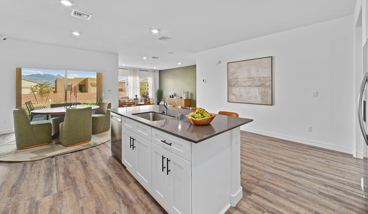Introducing the York — a thoughtfully designed new floor plan at Solterra by D.R. Horton in Green Valley. Offering 1,863 square feet of well-planned living space, the York is ideal for those seeking a home that balances comfort, flexibility, and modern design.  Step inside through the welcoming entryway and experience an open-concept layout that maximizes every square foot. The expansive great room serves as the heart of the home, flowing seamlessly into the dining area and kitchen, perfect for both everyday living and entertaining. The kitchen features a spacious center island, quartz countertops, Shaker-style cabinetry, and a dedicated pantry, delivering a clean, modern aesthetic with ample storage for all your culinary essentials.  The York is available in two- and three-bedroom configurations, offering flexibility to meet a variety of lifestyle needs. The primary suite is thoughtfully located at the rear of the home for added privacy and includes a linen closet, walk-in closet, and a well-appointed ensuite bathroom. Near the front of the home is a powder room, guest bedroom with walk-in closet and ensuite bathroom, and study that creates a functional layout for guests, work-from-home needs, or additional living space.  Designed with both comfort and practicality in mind, the York includes a utility room conveniently located near the kitchen and garage, providing easy access to the laundry area and additional storage. A covered back patio extends the living space outdoors—ideal for relaxing and enjoying Green Valley’s beautiful year-round weather.  Homes at Solterra feature elegant, modern interiors paired with distinctive exterior details, including sand finish texture stucco, landscaped front yards with auto drip irrigation, and fully fenced backyards. Covered back patios offer inviting spaces to unwind and take in Green Valley’s breathtaking sunsets. Inside, D.R. Horton’s Home is Connected® Smart Home package enhances everyday living with a smart thermostat, video doorbell, keyless entry, and a Wi-Fi–enabled garage door opener.  Outdoor enthusiasts will appreciate the close proximity to scenic neighborhood parks, Colossal Cave Mountain Park, and an extensive network of walking and biking trails throughout Green Valley—making the York a perfect blend of comfort, style, and lifestyle-driven design.  *Images shown are for reference only. They depict the York model home and may not represent the actual home.