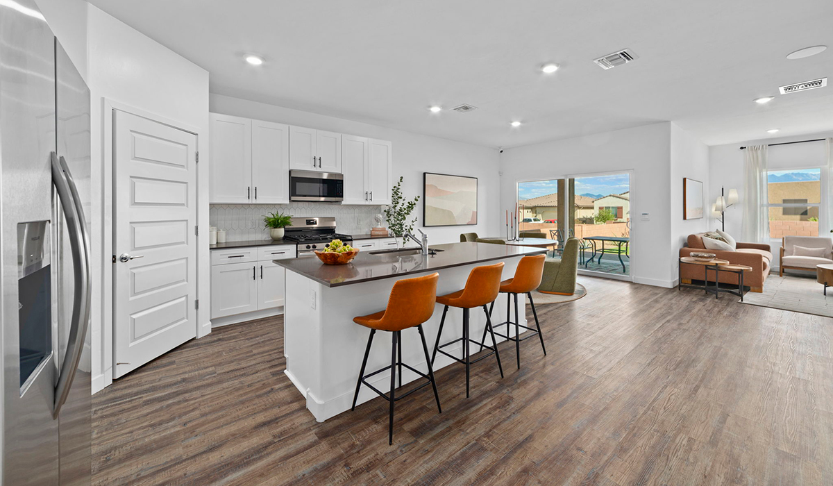 Introducing the York — a thoughtfully designed new floor plan at Solterra by D.R. Horton in Green Valley. Offering 1,863 square feet of well-planned living space, the York is ideal for those seeking a home that balances comfort, flexibility, and modern design.  Step inside through the welcoming entryway and experience an open-concept layout that maximizes every square foot. The expansive great room serves as the heart of the home, flowing seamlessly into the dining area and kitchen, perfect for both everyday living and entertaining. The kitchen features a spacious center island, quartz countertops, Shaker-style cabinetry, and a dedicated pantry, delivering a clean, modern aesthetic with ample storage for all your culinary essentials.  The York is available in two- and three-bedroom configurations, offering flexibility to meet a variety of lifestyle needs. The primary suite is thoughtfully located at the rear of the home for added privacy and includes a linen closet, walk-in closet, and a well-appointed ensuite bathroom. Near the front of the home is a powder room, guest bedroom with walk-in closet and ensuite bathroom, and study that creates a functional layout for guests, work-from-home needs, or additional living space.  Designed with both comfort and practicality in mind, the York includes a utility room conveniently located near the kitchen and garage, providing easy access to the laundry area and additional storage. A covered back patio extends the living space outdoors—ideal for relaxing and enjoying Green Valley’s beautiful year-round weather.  Homes at Solterra feature elegant, modern interiors paired with distinctive exterior details, including sand finish texture stucco, landscaped front yards with auto drip irrigation, and fully fenced backyards. Covered back patios offer inviting spaces to unwind and take in Green Valley’s breathtaking sunsets. Inside, D.R. Horton’s Home is Connected® Smart Home package enhances everyday living with a smart thermostat, video doorbell, keyless entry, and a Wi-Fi–enabled garage door opener.  Outdoor enthusiasts will appreciate the close proximity to scenic neighborhood parks, Colossal Cave Mountain Park, and an extensive network of walking and biking trails throughout Green Valley—making the York a perfect blend of comfort, style, and lifestyle-driven design.  *Images shown are for reference only. They depict the York model home and may not represent the actual home.