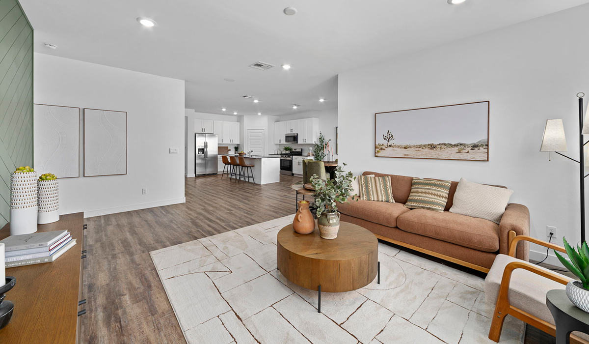 Introducing the York — a thoughtfully designed new floor plan at Solterra by D.R. Horton in Green Valley. Offering 1,863 square feet of well-planned living space, the York is ideal for those seeking a home that balances comfort, flexibility, and modern design.  Step inside through the welcoming entryway and experience an open-concept layout that maximizes every square foot. The expansive great room serves as the heart of the home, flowing seamlessly into the dining area and kitchen, perfect for both everyday living and entertaining. The kitchen features a spacious center island, quartz countertops, Shaker-style cabinetry, and a dedicated pantry, delivering a clean, modern aesthetic with ample storage for all your culinary essentials.  The York is available in two- and three-bedroom configurations, offering flexibility to meet a variety of lifestyle needs. The primary suite is thoughtfully located at the rear of the home for added privacy and includes a linen closet, walk-in closet, and a well-appointed ensuite bathroom. Near the front of the home is a powder room, guest bedroom with walk-in closet and ensuite bathroom, and study that creates a functional layout for guests, work-from-home needs, or additional living space.  Designed with both comfort and practicality in mind, the York includes a utility room conveniently located near the kitchen and garage, providing easy access to the laundry area and additional storage. A covered back patio extends the living space outdoors—ideal for relaxing and enjoying Green Valley’s beautiful year-round weather.  Homes at Solterra feature elegant, modern interiors paired with distinctive exterior details, including sand finish texture stucco, landscaped front yards with auto drip irrigation, and fully fenced backyards. Covered back patios offer inviting spaces to unwind and take in Green Valley’s breathtaking sunsets. Inside, D.R. Horton’s Home is Connected® Smart Home package enhances everyday living with a smart thermostat, video doorbell, keyless entry, and a Wi-Fi–enabled garage door opener.  Outdoor enthusiasts will appreciate the close proximity to scenic neighborhood parks, Colossal Cave Mountain Park, and an extensive network of walking and biking trails throughout Green Valley—making the York a perfect blend of comfort, style, and lifestyle-driven design.  *Images shown are for reference only. They depict the York model home and may not represent the actual home.