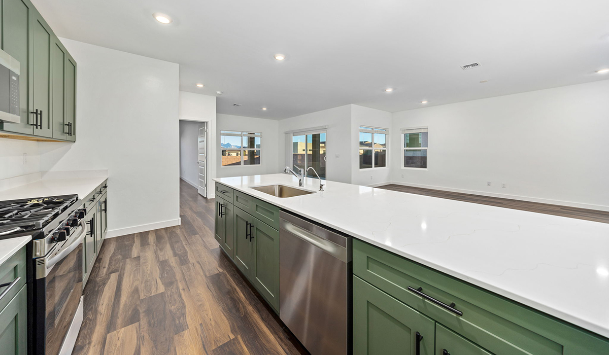 Introducing the Charleston — a beautifully designed new floor plan at Solterra by D.R. Horton in Green Valley. Offering 2,119 square feet of thoughtfully planned living space, the Charleston blends modern convenience with timeless elegance, creating a home that feels both refined and welcoming.  Step through the inviting entryway and into an open-concept layout designed to maximize every square foot. The expansive great room serves as the heart of the home, flowing seamlessly into the dining area and kitchen—ideal for both everyday living and entertaining. The kitchen features a spacious center island, quartz countertops, Shaker-style cabinetry, and a dedicated pantry, delivering a clean, modern aesthetic with ample storage for all your culinary needs.  The Charleston is available in two- and three-bedroom configurations, offering flexibility to meet a variety of lifestyle needs. The primary suite is thoughtfully located at the rear of the home for added privacy and includes a linen closet, walk-in closet, and a well-appointed ensuite bathroom. Near the front of the home is a powder room, guest bedroom with walk-in closet and ensuite bathroom, and study that creates a functional layout for guests, work-from-home needs, or additional living space.  Designed with practicality in mind, the Charleston includes a utility room conveniently located near the kitchen and garage, providing easy access to laundry and additional storage. A wrap around covered back patio extends the living space outdoors and is perfect for enjoying Green Valley’s beautiful year-round weather.  Homes at Solterra showcase elegant, modern interiors paired with distinctive exterior finishes, including sand finish texture stucco, landscaped front yards with auto drip irrigation, and fully fenced backyards. Covered back patios create inviting spaces to relax and take in Green Valley’s breathtaking sunsets. Inside, D.R. Horton’s Home is Connected® Smart Home package enhances everyday living with a smart thermostat, video doorbell, keyless entry, and a Wi-Fi–enabled garage door opener.  Outdoor enthusiasts will appreciate the close proximity to scenic neighborhood parks, Colossal Cave Mountain Park, and an abundance of walking and biking trails that weave throughout Green Valley, making the Charleston a perfect blend of comfort, style, and outdoor living.