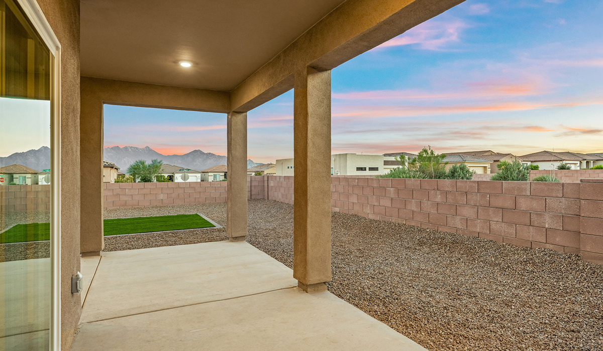 Introducing the Charleston — a beautifully designed new floor plan at Solterra by D.R. Horton in Green Valley. Offering 2,119 square feet of thoughtfully planned living space, the Charleston blends modern convenience with timeless elegance, creating a home that feels both refined and welcoming.  Step through the inviting entryway and into an open-concept layout designed to maximize every square foot. The expansive great room serves as the heart of the home, flowing seamlessly into the dining area and kitchen—ideal for both everyday living and entertaining. The kitchen features a spacious center island, quartz countertops, Shaker-style cabinetry, and a dedicated pantry, delivering a clean, modern aesthetic with ample storage for all your culinary needs.  The Charleston is available in two- and three-bedroom configurations, offering flexibility to meet a variety of lifestyle needs. The primary suite is thoughtfully located at the rear of the home for added privacy and includes a linen closet, walk-in closet, and a well-appointed ensuite bathroom. Near the front of the home is a powder room, guest bedroom with walk-in closet and ensuite bathroom, and study that creates a functional layout for guests, work-from-home needs, or additional living space.  Designed with practicality in mind, the Charleston includes a utility room conveniently located near the kitchen and garage, providing easy access to laundry and additional storage. A wrap around covered back patio extends the living space outdoors and is perfect for enjoying Green Valley’s beautiful year-round weather.  Homes at Solterra showcase elegant, modern interiors paired with distinctive exterior finishes, including sand finish texture stucco, landscaped front yards with auto drip irrigation, and fully fenced backyards. Covered back patios create inviting spaces to relax and take in Green Valley’s breathtaking sunsets. Inside, D.R. Horton’s Home is Connected® Smart Home package enhances everyday living with a smart thermostat, video doorbell, keyless entry, and a Wi-Fi–enabled garage door opener.  Outdoor enthusiasts will appreciate the close proximity to scenic neighborhood parks, Colossal Cave Mountain Park, and an abundance of walking and biking trails that weave throughout Green Valley, making the Charleston a perfect blend of comfort, style, and outdoor living.