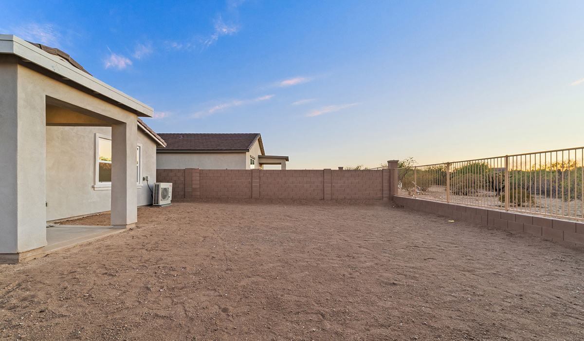 Welcome to The Aloe, a thoughtfully designed new floor plan at Entrada Del Toro, within the master-planned community of Rancho Sahuarita. Offering 1,310 square feet of efficient and comfortable living space, The Aloe is ideal for those seeking a home that blends functionality, modern style, and everyday ease.  Upon entry, you’re welcomed into an open-concept layout that maximizes every square foot. The large great room serves as the heart of the home and flows seamlessly into the dining area and kitchen—perfect for both relaxing and entertaining. The kitchen is beautifully appointed with a central island, quartz countertops, Shaker-style cabinetry, and a dedicated pantry, creating a clean, modern aesthetic with ample storage and workspace.  The Aloe features three well-proportioned bedrooms designed for comfort and flexibility. The private primary suite is tucked away at the rear of the home and includes a walk-in closet and en-suite bathroom. Two additional bedrooms are located near the front of the home.  Designed with convenience in mind, the home includes a utility room near the kitchen, offering easy access to laundry and additional storage. A covered back patio extends the living space outdoors, providing the perfect setting to enjoy Sahuarita’s beautiful weather and scenic surroundings.  Residents of Entrada Del Toro enjoy access to Rancho Sahuarita’s extensive resort-style amenities, including a full-service fitness center, multiple swimming pools, pickleball courts, splash pads, playgrounds, and expansive parks designed for all ages and lifestyles. Homeowners will also have exclusive access to the brand-new Entrada Del Toro Community Center, scheduled to open in Spring 2026, featuring modern gathering spaces and recreational amenities just steps from home.  *Images shown are for reference only. They depict The Aloe spec home and may not represent the actual home.