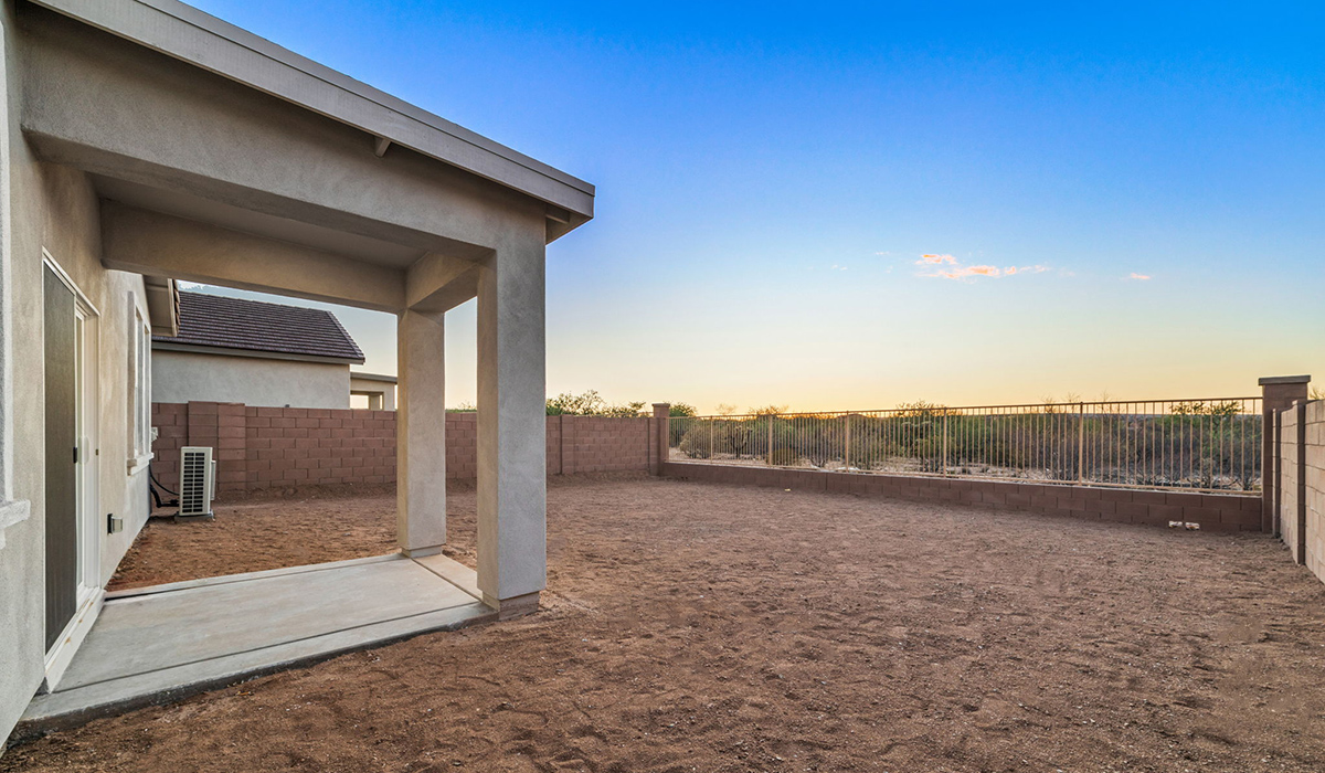 Welcome to The Aloe, a thoughtfully designed new floor plan at Entrada Del Toro, within the master-planned community of Rancho Sahuarita. Offering 1,310 square feet of efficient and comfortable living space, The Aloe is ideal for those seeking a home that blends functionality, modern style, and everyday ease.  Upon entry, you’re welcomed into an open-concept layout that maximizes every square foot. The large great room serves as the heart of the home and flows seamlessly into the dining area and kitchen—perfect for both relaxing and entertaining. The kitchen is beautifully appointed with a central island, quartz countertops, Shaker-style cabinetry, and a dedicated pantry, creating a clean, modern aesthetic with ample storage and workspace.  The Aloe features three well-proportioned bedrooms designed for comfort and flexibility. The private primary suite is tucked away at the rear of the home and includes a walk-in closet and en-suite bathroom. Two additional bedrooms are located near the front of the home.  Designed with convenience in mind, the home includes a utility room near the kitchen, offering easy access to laundry and additional storage. A covered back patio extends the living space outdoors, providing the perfect setting to enjoy Sahuarita’s beautiful weather and scenic surroundings.  Residents of Entrada Del Toro enjoy access to Rancho Sahuarita’s extensive resort-style amenities, including a full-service fitness center, multiple swimming pools, pickleball courts, splash pads, playgrounds, and expansive parks designed for all ages and lifestyles. Homeowners will also have exclusive access to the brand-new Entrada Del Toro Community Center, scheduled to open in Spring 2026, featuring modern gathering spaces and recreational amenities just steps from home.  *Images shown are for reference only. They depict The Aloe spec home and may not represent the actual home.
