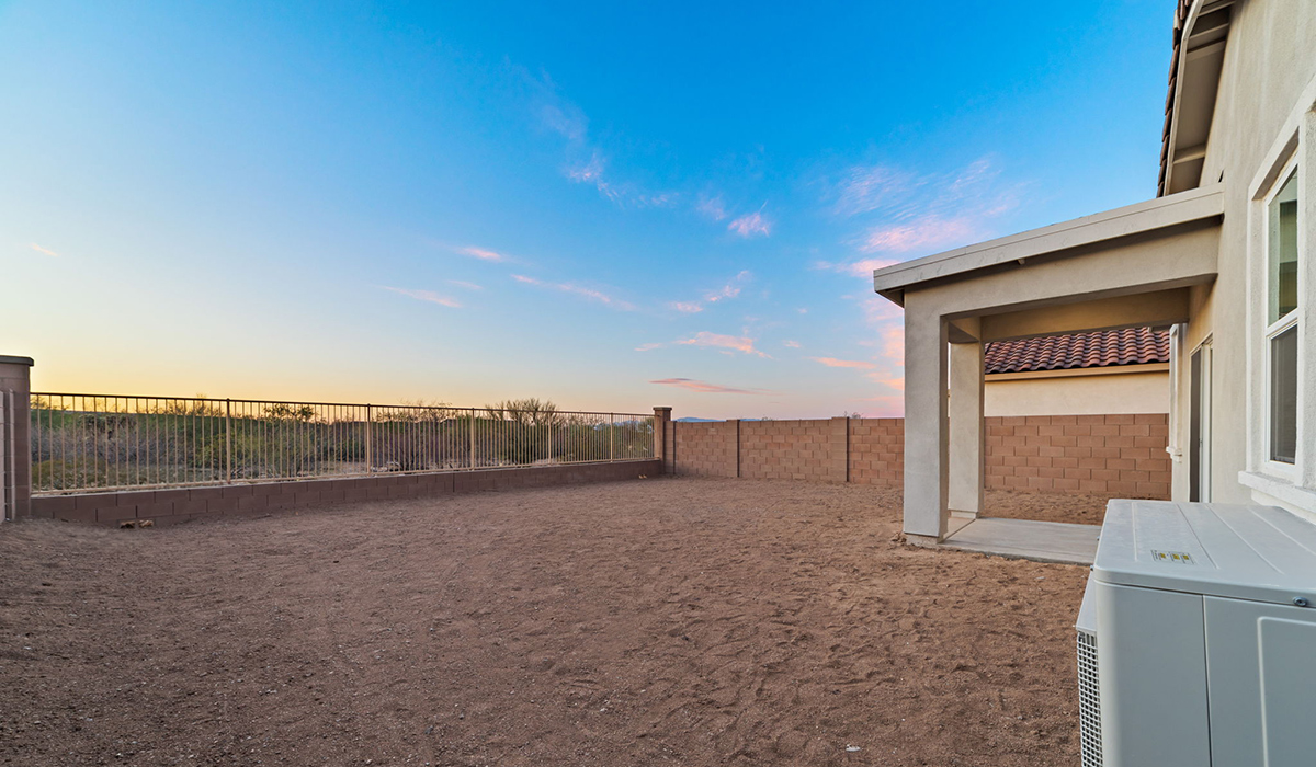 Welcome to The Aloe, a thoughtfully designed new floor plan at Entrada Del Toro, within the master-planned community of Rancho Sahuarita. Offering 1,310 square feet of efficient and comfortable living space, The Aloe is ideal for those seeking a home that blends functionality, modern style, and everyday ease.  Upon entry, you’re welcomed into an open-concept layout that maximizes every square foot. The large great room serves as the heart of the home and flows seamlessly into the dining area and kitchen—perfect for both relaxing and entertaining. The kitchen is beautifully appointed with a central island, quartz countertops, Shaker-style cabinetry, and a dedicated pantry, creating a clean, modern aesthetic with ample storage and workspace.  The Aloe features three well-proportioned bedrooms designed for comfort and flexibility. The private primary suite is tucked away at the rear of the home and includes a walk-in closet and en-suite bathroom. Two additional bedrooms are located near the front of the home.  Designed with convenience in mind, the home includes a utility room near the kitchen, offering easy access to laundry and additional storage. A covered back patio extends the living space outdoors, providing the perfect setting to enjoy Sahuarita’s beautiful weather and scenic surroundings.  Residents of Entrada Del Toro enjoy access to Rancho Sahuarita’s extensive resort-style amenities, including a full-service fitness center, multiple swimming pools, pickleball courts, splash pads, playgrounds, and expansive parks designed for all ages and lifestyles. Homeowners will also have exclusive access to the brand-new Entrada Del Toro Community Center, scheduled to open in Spring 2026, featuring modern gathering spaces and recreational amenities just steps from home.  *Images shown are for reference only. They depict The Aloe spec home and may not represent the actual home.