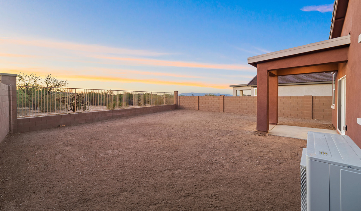 Welcome to The Aloe, a thoughtfully designed new floor plan at Entrada Del Toro, within the master-planned community of Rancho Sahuarita. Offering 1,310 square feet of efficient and comfortable living space, The Aloe is ideal for those seeking a home that blends functionality, modern style, and everyday ease.  Upon entry, you’re welcomed into an open-concept layout that maximizes every square foot. The large great room serves as the heart of the home and flows seamlessly into the dining area and kitchen—perfect for both relaxing and entertaining. The kitchen is beautifully appointed with a central island, quartz countertops, Shaker-style cabinetry, and a dedicated pantry, creating a clean, modern aesthetic with ample storage and workspace.  The Aloe features three well-proportioned bedrooms designed for comfort and flexibility. The private primary suite is tucked away at the rear of the home and includes a walk-in closet and en-suite bathroom. Two additional bedrooms are located near the front of the home.  Designed with convenience in mind, the home includes a utility room near the kitchen, offering easy access to laundry and additional storage. A covered back patio extends the living space outdoors, providing the perfect setting to enjoy Sahuarita’s beautiful weather and scenic surroundings.  Residents of Entrada Del Toro enjoy access to Rancho Sahuarita’s extensive resort-style amenities, including a full-service fitness center, multiple swimming pools, pickleball courts, splash pads, playgrounds, and expansive parks designed for all ages and lifestyles. Homeowners will also have exclusive access to the brand-new Entrada Del Toro Community Center, scheduled to open in Spring 2026, featuring modern gathering spaces and recreational amenities just steps from home.  *Images shown are for reference only. They depict The Aloe spec home and may not represent the actual home.