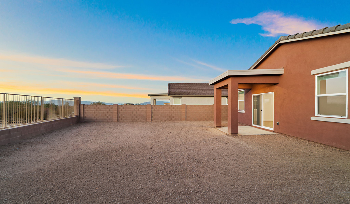 Welcome to The Aloe, a thoughtfully designed new floor plan at Entrada Del Toro, within the master-planned community of Rancho Sahuarita. Offering 1,310 square feet of efficient and comfortable living space, The Aloe is ideal for those seeking a home that blends functionality, modern style, and everyday ease.  Upon entry, you’re welcomed into an open-concept layout that maximizes every square foot. The large great room serves as the heart of the home and flows seamlessly into the dining area and kitchen—perfect for both relaxing and entertaining. The kitchen is beautifully appointed with a central island, quartz countertops, Shaker-style cabinetry, and a dedicated pantry, creating a clean, modern aesthetic with ample storage and workspace.  The Aloe features three well-proportioned bedrooms designed for comfort and flexibility. The private primary suite is tucked away at the rear of the home and includes a walk-in closet and en-suite bathroom. Two additional bedrooms are located near the front of the home.  Designed with convenience in mind, the home includes a utility room near the kitchen, offering easy access to laundry and additional storage. A covered back patio extends the living space outdoors, providing the perfect setting to enjoy Sahuarita’s beautiful weather and scenic surroundings.  Residents of Entrada Del Toro enjoy access to Rancho Sahuarita’s extensive resort-style amenities, including a full-service fitness center, multiple swimming pools, pickleball courts, splash pads, playgrounds, and expansive parks designed for all ages and lifestyles. Homeowners will also have exclusive access to the brand-new Entrada Del Toro Community Center, scheduled to open in Spring 2026, featuring modern gathering spaces and recreational amenities just steps from home.  *Images shown are for reference only. They depict The Aloe spec home and may not represent the actual home.
