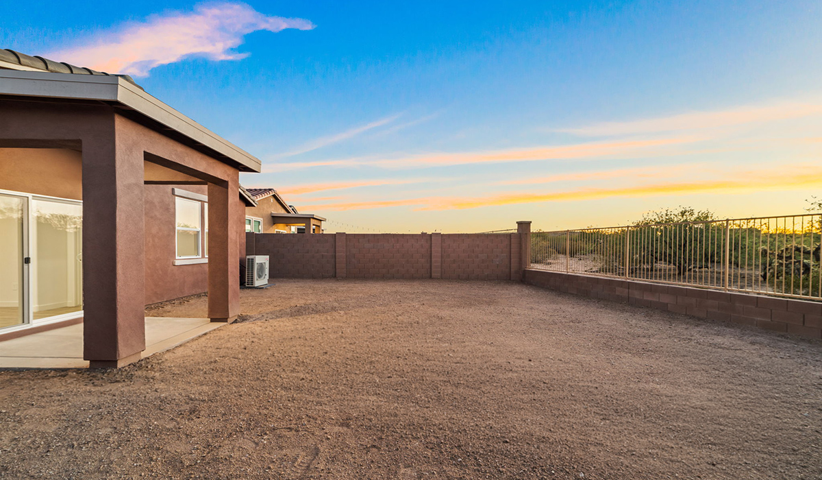Welcome to The Aloe, a thoughtfully designed new floor plan at Entrada Del Toro, within the master-planned community of Rancho Sahuarita. Offering 1,310 square feet of efficient and comfortable living space, The Aloe is ideal for those seeking a home that blends functionality, modern style, and everyday ease.  Upon entry, you’re welcomed into an open-concept layout that maximizes every square foot. The large great room serves as the heart of the home and flows seamlessly into the dining area and kitchen—perfect for both relaxing and entertaining. The kitchen is beautifully appointed with a central island, quartz countertops, Shaker-style cabinetry, and a dedicated pantry, creating a clean, modern aesthetic with ample storage and workspace.  The Aloe features three well-proportioned bedrooms designed for comfort and flexibility. The private primary suite is tucked away at the rear of the home and includes a walk-in closet and en-suite bathroom. Two additional bedrooms are located near the front of the home.  Designed with convenience in mind, the home includes a utility room near the kitchen, offering easy access to laundry and additional storage. A covered back patio extends the living space outdoors, providing the perfect setting to enjoy Sahuarita’s beautiful weather and scenic surroundings.  Residents of Entrada Del Toro enjoy access to Rancho Sahuarita’s extensive resort-style amenities, including a full-service fitness center, multiple swimming pools, pickleball courts, splash pads, playgrounds, and expansive parks designed for all ages and lifestyles. Homeowners will also have exclusive access to the brand-new Entrada Del Toro Community Center, scheduled to open in Spring 2026, featuring modern gathering spaces and recreational amenities just steps from home.  *Images shown are for reference only. They depict The Aloe spec home and may not represent the actual home.