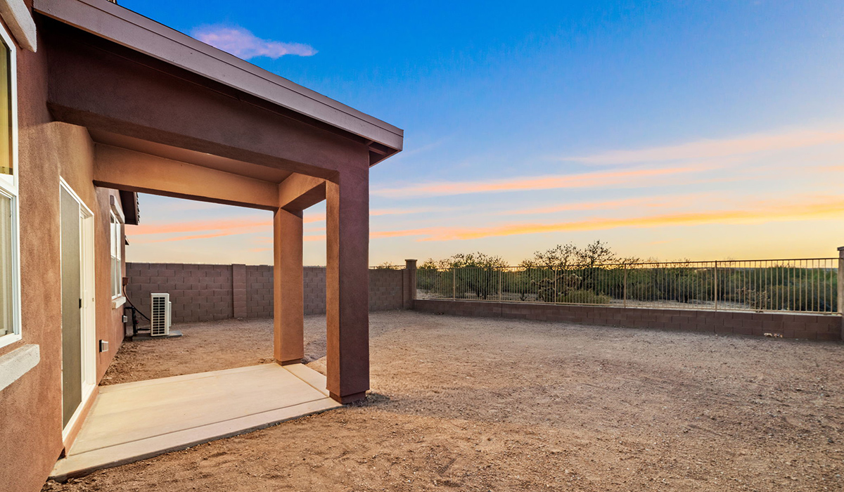 Welcome to The Aloe, a thoughtfully designed new floor plan at Entrada Del Toro, within the master-planned community of Rancho Sahuarita. Offering 1,310 square feet of efficient and comfortable living space, The Aloe is ideal for those seeking a home that blends functionality, modern style, and everyday ease.  Upon entry, you’re welcomed into an open-concept layout that maximizes every square foot. The large great room serves as the heart of the home and flows seamlessly into the dining area and kitchen—perfect for both relaxing and entertaining. The kitchen is beautifully appointed with a central island, quartz countertops, Shaker-style cabinetry, and a dedicated pantry, creating a clean, modern aesthetic with ample storage and workspace.  The Aloe features three well-proportioned bedrooms designed for comfort and flexibility. The private primary suite is tucked away at the rear of the home and includes a walk-in closet and en-suite bathroom. Two additional bedrooms are located near the front of the home.  Designed with convenience in mind, the home includes a utility room near the kitchen, offering easy access to laundry and additional storage. A covered back patio extends the living space outdoors, providing the perfect setting to enjoy Sahuarita’s beautiful weather and scenic surroundings.  Residents of Entrada Del Toro enjoy access to Rancho Sahuarita’s extensive resort-style amenities, including a full-service fitness center, multiple swimming pools, pickleball courts, splash pads, playgrounds, and expansive parks designed for all ages and lifestyles. Homeowners will also have exclusive access to the brand-new Entrada Del Toro Community Center, scheduled to open in Spring 2026, featuring modern gathering spaces and recreational amenities just steps from home.  *Images shown are for reference only. They depict The Aloe spec home and may not represent the actual home.