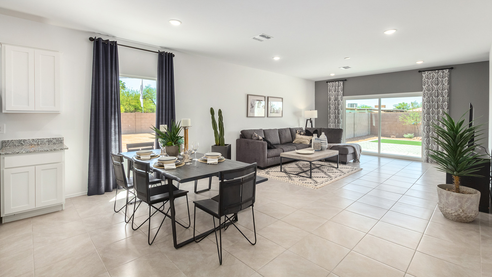 Introducing the Gaven at Entrada Del Toro  The Gaven is a beautifully designed single-story home located in the highly desirable Entrada Del Toro neighborhood within the master-planned community of Rancho Sahuarita. Offering 1,945 square feet of thoughtfully planned living space, this inviting home features four bedrooms, two full bathrooms, a covered back patio, and a two-car garage—perfect for households seeking comfort, functionality, and room to grow.  From the moment you enter, the welcoming entryway opens into an expansive open-concept layout that seamlessly connects the great room, dining area, and kitchen—creating a space ideal for everyday living and effortless entertaining. The kitchen is a true centerpiece, complete with a large center island, Shaker-style cabinetry, quartz countertops, a walk-in pantry, and ample storage. Abundant natural light enhances the home’s warm and welcoming atmosphere throughout.  The Gaven offers a thoughtfully arranged split-bedroom design, with three secondary bedrooms located near the front of the home, providing flexibility for guests, home offices, or hobbies. Tucked away for privacy, the spacious primary suite serves as a peaceful retreat and features an en-suite bathroom and a generous walk-in closet.  Homes at Entrada Del Toro are designed with the future in mind. Exterior features include a light lace stucco finish, professionally landscaped front yards with automatic drip irrigation, and large, fully fenced backyards ready for your personal touch. Inside, the Home is Connected® Smart Home package delivers modern convenience with a smart thermostat, video doorbell, keyless entry, and a Wi-Fi® enabled garage door opener.  With its spacious living areas, flexible bedroom layout, and thoughtful design throughout, the Gaven offers the perfect blend of comfort, convenience, and livability.  Residents of Entrada Del Toro enjoy access to Rancho Sahuarita’s extensive amenities, including a full-service fitness center, multiple resort-style swimming pools, pickleball courts, splash pads, playgrounds, and expansive parks designed for all ages and lifestyles. Homeowners will also have exclusive access to the brand-new Entrada Del Toro Community Center, scheduled to open in Spring 2026, offering modern gathering spaces and recreational features just moments from home.  *Images shown are for reference only. They depict The Gaven model home and may not represent the actual home.