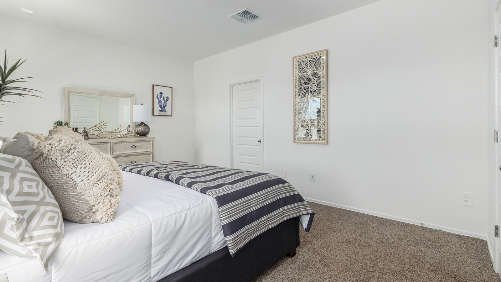 Introducing the Gaven at Entrada Del Toro  The Gaven is a beautifully designed single-story home located in the highly desirable Entrada Del Toro neighborhood within the master-planned community of Rancho Sahuarita. Offering 1,945 square feet of thoughtfully planned living space, this inviting home features four bedrooms, two full bathrooms, a covered back patio, and a two-car garage—perfect for households seeking comfort, functionality, and room to grow.  From the moment you enter, the welcoming entryway opens into an expansive open-concept layout that seamlessly connects the great room, dining area, and kitchen—creating a space ideal for everyday living and effortless entertaining. The kitchen is a true centerpiece, complete with a large center island, Shaker-style cabinetry, quartz countertops, a walk-in pantry, and ample storage. Abundant natural light enhances the home’s warm and welcoming atmosphere throughout.  The Gaven offers a thoughtfully arranged split-bedroom design, with three secondary bedrooms located near the front of the home, providing flexibility for guests, home offices, or hobbies. Tucked away for privacy, the spacious primary suite serves as a peaceful retreat and features an en-suite bathroom and a generous walk-in closet.  Homes at Entrada Del Toro are designed with the future in mind. Exterior features include a light lace stucco finish, professionally landscaped front yards with automatic drip irrigation, and large, fully fenced backyards ready for your personal touch. Inside, the Home is Connected® Smart Home package delivers modern convenience with a smart thermostat, video doorbell, keyless entry, and a Wi-Fi® enabled garage door opener.  With its spacious living areas, flexible bedroom layout, and thoughtful design throughout, the Gaven offers the perfect blend of comfort, convenience, and livability.  Residents of Entrada Del Toro enjoy access to Rancho Sahuarita’s extensive amenities, including a full-service fitness center, multiple resort-style swimming pools, pickleball courts, splash pads, playgrounds, and expansive parks designed for all ages and lifestyles. Homeowners will also have exclusive access to the brand-new Entrada Del Toro Community Center, scheduled to open in Spring 2026, offering modern gathering spaces and recreational features just moments from home.  *Images shown are for reference only. They depict The Gaven model home and may not represent the actual home.