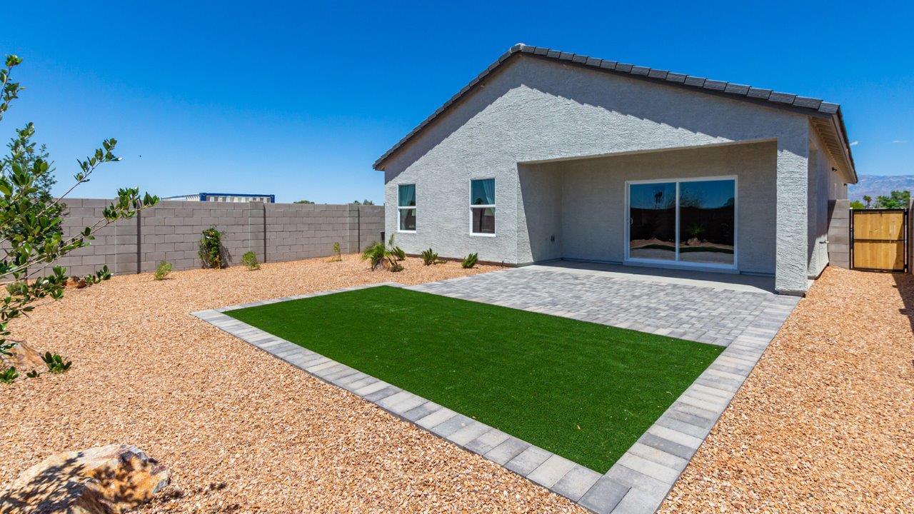 Introducing the Gaven at Entrada Del Toro  The Gaven is a beautifully designed single-story home located in the highly desirable Entrada Del Toro neighborhood within the master-planned community of Rancho Sahuarita. Offering 1,945 square feet of thoughtfully planned living space, this inviting home features four bedrooms, two full bathrooms, a covered back patio, and a two-car garage—perfect for households seeking comfort, functionality, and room to grow.  From the moment you enter, the welcoming entryway opens into an expansive open-concept layout that seamlessly connects the great room, dining area, and kitchen—creating a space ideal for everyday living and effortless entertaining. The kitchen is a true centerpiece, complete with a large center island, Shaker-style cabinetry, quartz countertops, a walk-in pantry, and ample storage. Abundant natural light enhances the home’s warm and welcoming atmosphere throughout.  The Gaven offers a thoughtfully arranged split-bedroom design, with three secondary bedrooms located near the front of the home, providing flexibility for guests, home offices, or hobbies. Tucked away for privacy, the spacious primary suite serves as a peaceful retreat and features an en-suite bathroom and a generous walk-in closet.  Homes at Entrada Del Toro are designed with the future in mind. Exterior features include a light lace stucco finish, professionally landscaped front yards with automatic drip irrigation, and large, fully fenced backyards ready for your personal touch. Inside, the Home is Connected® Smart Home package delivers modern convenience with a smart thermostat, video doorbell, keyless entry, and a Wi-Fi® enabled garage door opener.  With its spacious living areas, flexible bedroom layout, and thoughtful design throughout, the Gaven offers the perfect blend of comfort, convenience, and livability.  Residents of Entrada Del Toro enjoy access to Rancho Sahuarita’s extensive amenities, including a full-service fitness center, multiple resort-style swimming pools, pickleball courts, splash pads, playgrounds, and expansive parks designed for all ages and lifestyles. Homeowners will also have exclusive access to the brand-new Entrada Del Toro Community Center, scheduled to open in Spring 2026, offering modern gathering spaces and recreational features just moments from home.  *Images shown are for reference only. They depict The Gaven model home and may not represent the actual home.