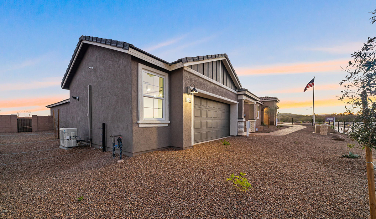 Introducing the Carolina — a thoughtfully designed single-story home offering 1,608 sq. ft. of modern comfort at Entrada Del Toro, a master-planned community in Rancho Sahuarita.  With three bedrooms, two full bathrooms, and a two-car garage, this efficient and beautifully planned layout is perfect for those seeking convenience, comfort, and single-level living.  A welcoming front porch invites you inside, where the entryway opens into a bright and beautifully crafted living space. The heart of the home is the well-appointed kitchen, featuring a large center island, walk-in pantry, and stylish Shaker-style cabinetry. Overlooking the dining area and great room, this open layout makes it easy to cook, gather, and entertain with ease.  The primary bedroom is thoughtfully positioned at the rear of the home, creating a private retreat. Complete with a large en-suite bathroom and walk-in closet, it’s designed for relaxation and convenience.  Two additional bedrooms are located toward the front of the home, offering flexibility for family, guests, a home office, or hobbies, and share a full secondary hallway bathroom.  Our homes at Entrada Del Toro are designed with the future in mind. Each home features a light lace stucco exterior, landscaped front yards with auto drip irrigation, and large backyards that are fully fenced and ready for your personal touch. Inside, the Home is Connected® Smart Home package brings modern convenience to your fingertips with a smart thermostat, video doorbell, keyless entry, and a Wi-Fi® enabled garage door opener.  With its smart layout, modern features, and effortless single-story living, the Carolina brings comfort and functionality together in a one beautifully designed home here at Entrada Del Toro.  Residents of Entrada Del Toro will enjoy access to Rancho Sahuarita’s extensive amenity offerings, which include a full-service fitness center, multiple large swimming pools, pickle-ball courts, splash pads, playgrounds, and sizable parks and recreational spaces designed for all ages and lifestyles. In addition, homeowners will have exclusive access to the brand-new Entrada Del Toro Community Center, scheduled to open Spring 2026, further enhancing the neighborhood experience with modern gathering and recreational spaces close to home.  *Images shown are for reference only. They depict The Carolina model home and may not represent the actual home.