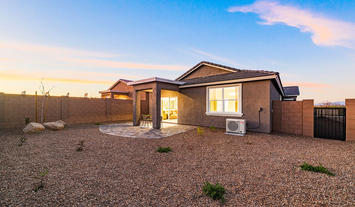 Introducing the Carolina — a thoughtfully designed single-story home offering 1,608 sq. ft. of modern comfort at Entrada Del Toro, a master-planned community in Rancho Sahuarita.  With three bedrooms, two full bathrooms, and a two-car garage, this efficient and beautifully planned layout is perfect for those seeking convenience, comfort, and single-level living.  A welcoming front porch invites you inside, where the entryway opens into a bright and beautifully crafted living space. The heart of the home is the well-appointed kitchen, featuring a large center island, walk-in pantry, and stylish Shaker-style cabinetry. Overlooking the dining area and great room, this open layout makes it easy to cook, gather, and entertain with ease.  The primary bedroom is thoughtfully positioned at the rear of the home, creating a private retreat. Complete with a large en-suite bathroom and walk-in closet, it’s designed for relaxation and convenience.  Two additional bedrooms are located toward the front of the home, offering flexibility for family, guests, a home office, or hobbies, and share a full secondary hallway bathroom.  Our homes at Entrada Del Toro are designed with the future in mind. Each home features a light lace stucco exterior, landscaped front yards with auto drip irrigation, and large backyards that are fully fenced and ready for your personal touch. Inside, the Home is Connected® Smart Home package brings modern convenience to your fingertips with a smart thermostat, video doorbell, keyless entry, and a Wi-Fi® enabled garage door opener.  With its smart layout, modern features, and effortless single-story living, the Carolina brings comfort and functionality together in a one beautifully designed home here at Entrada Del Toro.  Residents of Entrada Del Toro will enjoy access to Rancho Sahuarita’s extensive amenity offerings, which include a full-service fitness center, multiple large swimming pools, pickle-ball courts, splash pads, playgrounds, and sizable parks and recreational spaces designed for all ages and lifestyles. In addition, homeowners will have exclusive access to the brand-new Entrada Del Toro Community Center, scheduled to open Spring 2026, further enhancing the neighborhood experience with modern gathering and recreational spaces close to home.  *Images shown are for reference only. They depict The Carolina sales model home and may not represent the actual home.