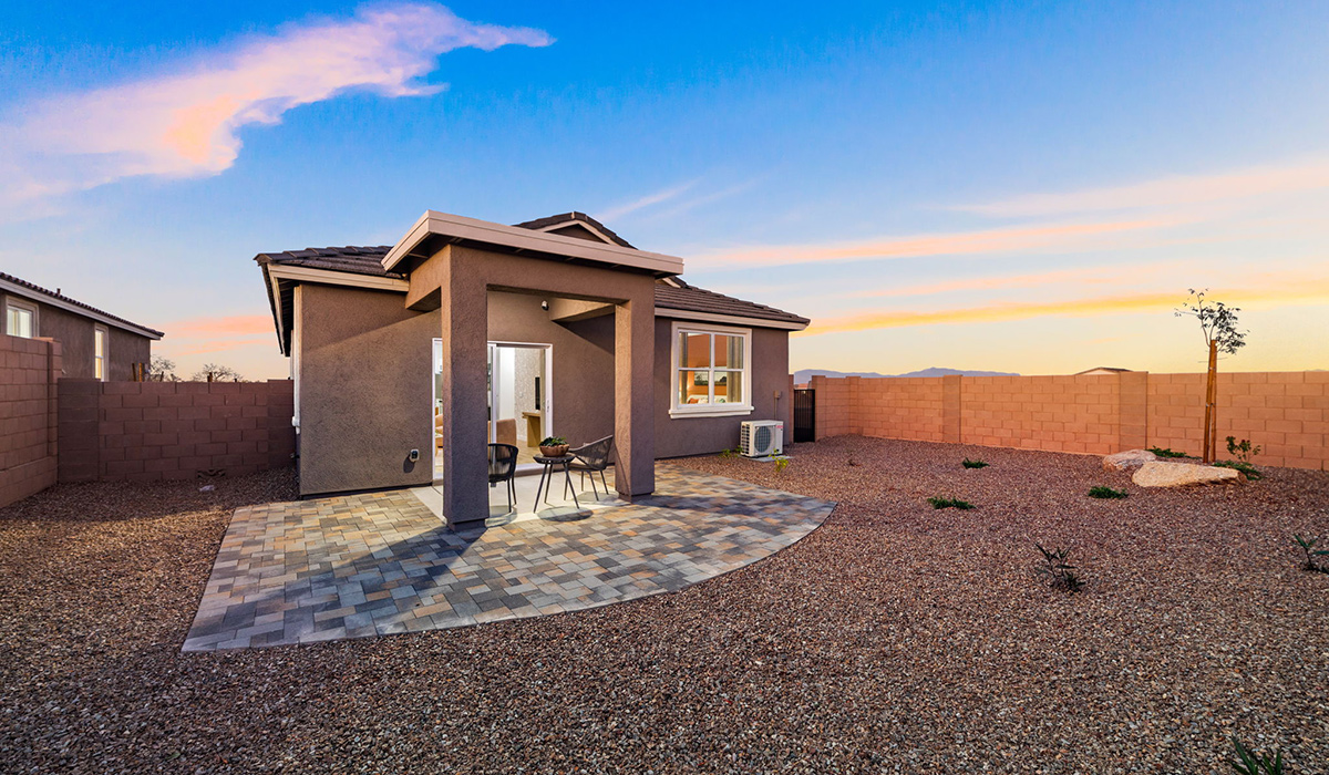 Introducing the Carolina — a thoughtfully designed single-story home offering 1,608 sq. ft. of modern comfort at Entrada Del Toro, a master-planned community in Rancho Sahuarita.  With three bedrooms, two full bathrooms, and a two-car garage, this efficient and beautifully planned layout is perfect for those seeking convenience, comfort, and single-level living.  A welcoming front porch invites you inside, where the entryway opens into a bright and beautifully crafted living space. The heart of the home is the well-appointed kitchen, featuring a large center island, walk-in pantry, and stylish Shaker-style cabinetry. Overlooking the dining area and great room, this open layout makes it easy to cook, gather, and entertain with ease.  The primary bedroom is thoughtfully positioned at the rear of the home, creating a private retreat. Complete with a large en-suite bathroom and walk-in closet, it’s designed for relaxation and convenience.  Two additional bedrooms are located toward the front of the home, offering flexibility for family, guests, a home office, or hobbies, and share a full secondary hallway bathroom.  Our homes at Entrada Del Toro are designed with the future in mind. Each home features a light lace stucco exterior, landscaped front yards with auto drip irrigation, and large backyards that are fully fenced and ready for your personal touch. Inside, the Home is Connected® Smart Home package brings modern convenience to your fingertips with a smart thermostat, video doorbell, keyless entry, and a Wi-Fi® enabled garage door opener.  With its smart layout, modern features, and effortless single-story living, the Carolina brings comfort and functionality together in a one beautifully designed home here at Entrada Del Toro.  Residents of Entrada Del Toro will enjoy access to Rancho Sahuarita’s extensive amenity offerings, which include a full-service fitness center, multiple large swimming pools, pickle-ball courts, splash pads, playgrounds, and sizable parks and recreational spaces designed for all ages and lifestyles. In addition, homeowners will have exclusive access to the brand-new Entrada Del Toro Community Center, scheduled to open Spring 2026, further enhancing the neighborhood experience with modern gathering and recreational spaces close to home.  *Images shown are for reference only. They depict The Carolina sales model home and may not represent the actual home.