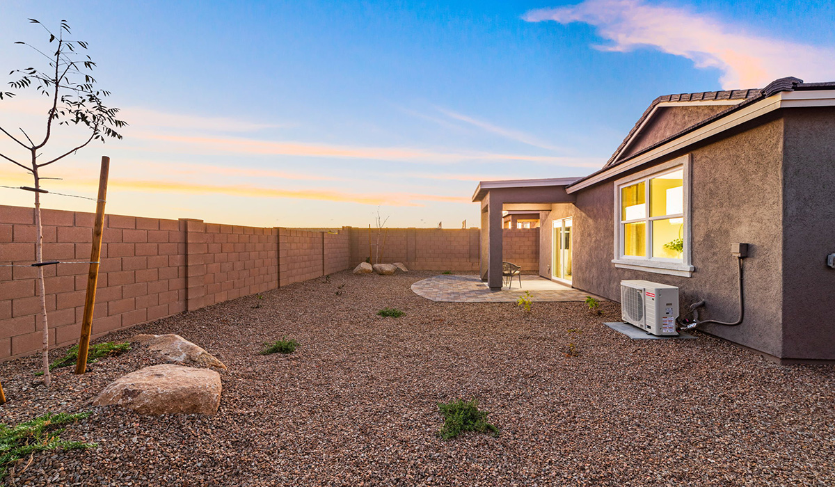 Introducing the Carolina — a thoughtfully designed single-story home offering 1,608 sq. ft. of modern comfort at Entrada Del Toro, a master-planned community in Rancho Sahuarita.  With three bedrooms, two full bathrooms, and a two-car garage, this efficient and beautifully planned layout is perfect for those seeking convenience, comfort, and single-level living.  A welcoming front porch invites you inside, where the entryway opens into a bright and beautifully crafted living space. The heart of the home is the well-appointed kitchen, featuring a large center island, walk-in pantry, and stylish Shaker-style cabinetry. Overlooking the dining area and great room, this open layout makes it easy to cook, gather, and entertain with ease.  The primary bedroom is thoughtfully positioned at the rear of the home, creating a private retreat. Complete with a large en-suite bathroom and walk-in closet, it’s designed for relaxation and convenience.  Two additional bedrooms are located toward the front of the home, offering flexibility for family, guests, a home office, or hobbies, and share a full secondary hallway bathroom.  Our homes at Entrada Del Toro are designed with the future in mind. Each home features a light lace stucco exterior, landscaped front yards with auto drip irrigation, and large backyards that are fully fenced and ready for your personal touch. Inside, the Home is Connected® Smart Home package brings modern convenience to your fingertips with a smart thermostat, video doorbell, keyless entry, and a Wi-Fi® enabled garage door opener.  With its smart layout, modern features, and effortless single-story living, the Carolina brings comfort and functionality together in a one beautifully designed home here at Entrada Del Toro.  Residents of Entrada Del Toro will enjoy access to Rancho Sahuarita’s extensive amenity offerings, which include a full-service fitness center, multiple large swimming pools, pickle-ball courts, splash pads, playgrounds, and sizable parks and recreational spaces designed for all ages and lifestyles. In addition, homeowners will have exclusive access to the brand-new Entrada Del Toro Community Center, scheduled to open Spring 2026, further enhancing the neighborhood experience with modern gathering and recreational spaces close to home.  *Images shown are for reference only. They depict The Carolina sales model home and may not represent the actual home.
