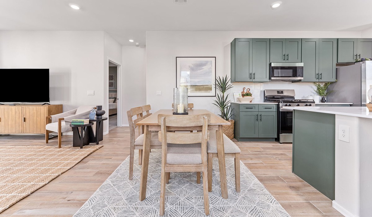 Introducing the Carolina — a thoughtfully designed single-story home offering 1,608 sq. ft. of modern comfort at Entrada Del Toro, a master-planned community in Rancho Sahuarita.  With three bedrooms, two full bathrooms, and a two-car garage, this efficient and beautifully planned layout is perfect for those seeking convenience, comfort, and single-level living.  A welcoming front porch invites you inside, where the entryway opens into a bright and beautifully crafted living space. The heart of the home is the well-appointed kitchen, featuring a large center island, walk-in pantry, and stylish Shaker-style cabinetry. Overlooking the dining area and great room, this open layout makes it easy to cook, gather, and entertain with ease.  The primary bedroom is thoughtfully positioned at the rear of the home, creating a private retreat. Complete with a large en-suite bathroom and walk-in closet, it’s designed for relaxation and convenience.  Two additional bedrooms are located toward the front of the home, offering flexibility for family, guests, a home office, or hobbies, and share a full secondary hallway bathroom.  Our homes at Entrada Del Toro are designed with the future in mind. Each home features a light lace stucco exterior, landscaped front yards with auto drip irrigation, and large backyards that are fully fenced and ready for your personal touch. Inside, the Home is Connected® Smart Home package brings modern convenience to your fingertips with a smart thermostat, video doorbell, keyless entry, and a Wi-Fi® enabled garage door opener.  With its smart layout, modern features, and effortless single-story living, the Carolina brings comfort and functionality together in a one beautifully designed home here at Entrada Del Toro.  Residents of Entrada Del Toro will enjoy access to Rancho Sahuarita’s extensive amenity offerings, which include a full-service fitness center, multiple large swimming pools, pickle-ball courts, splash pads, playgrounds, and sizable parks and recreational spaces designed for all ages and lifestyles. In addition, homeowners will have exclusive access to the brand-new Entrada Del Toro Community Center, scheduled to open Spring 2026, further enhancing the neighborhood experience with modern gathering and recreational spaces close to home.