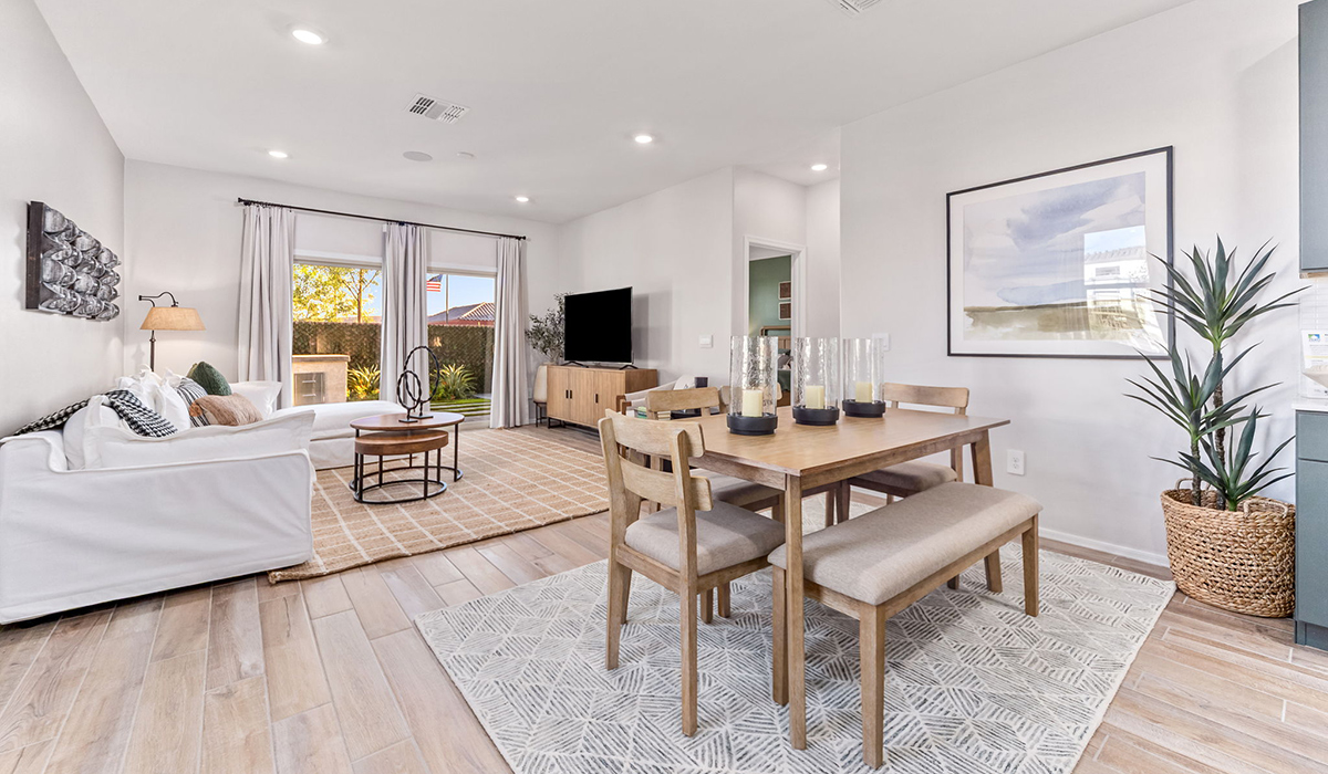 Introducing the Carolina — a thoughtfully designed single-story home offering 1,608 sq. ft. of modern comfort at Entrada Del Toro, a master-planned community in Rancho Sahuarita.  With three bedrooms, two full bathrooms, and a two-car garage, this efficient and beautifully planned layout is perfect for those seeking convenience, comfort, and single-level living.  A welcoming front porch invites you inside, where the entryway opens into a bright and beautifully crafted living space. The heart of the home is the well-appointed kitchen, featuring a large center island, walk-in pantry, and stylish Shaker-style cabinetry. Overlooking the dining area and great room, this open layout makes it easy to cook, gather, and entertain with ease.  The primary bedroom is thoughtfully positioned at the rear of the home, creating a private retreat. Complete with a large en-suite bathroom and walk-in closet, it’s designed for relaxation and convenience.  Two additional bedrooms are located toward the front of the home, offering flexibility for family, guests, a home office, or hobbies, and share a full secondary hallway bathroom.  Our homes at Entrada Del Toro are designed with the future in mind. Each home features a light lace stucco exterior, landscaped front yards with auto drip irrigation, and large backyards that are fully fenced and ready for your personal touch. Inside, the Home is Connected® Smart Home package brings modern convenience to your fingertips with a smart thermostat, video doorbell, keyless entry, and a Wi-Fi® enabled garage door opener.  With its smart layout, modern features, and effortless single-story living, the Carolina brings comfort and functionality together in a one beautifully designed home here at Entrada Del Toro.  Residents of Entrada Del Toro will enjoy access to Rancho Sahuarita’s extensive amenity offerings, which include a full-service fitness center, multiple large swimming pools, pickle-ball courts, splash pads, playgrounds, and sizable parks and recreational spaces designed for all ages and lifestyles. In addition, homeowners will have exclusive access to the brand-new Entrada Del Toro Community Center, scheduled to open Spring 2026, further enhancing the neighborhood experience with modern gathering and recreational spaces close to home.