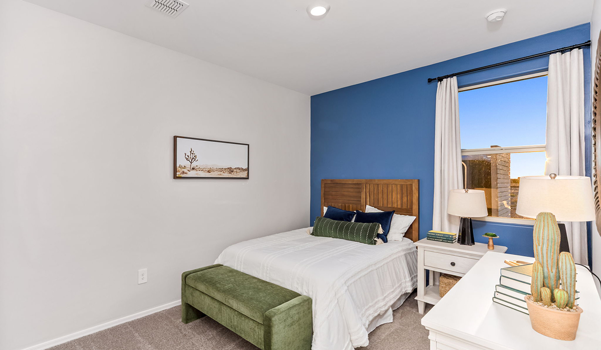 Introducing the Carolina — a thoughtfully designed single-story home offering 1,608 sq. ft. of modern comfort at Entrada Del Toro, a master-planned community in Rancho Sahuarita.  With three bedrooms, two full bathrooms, and a two-car garage, this efficient and beautifully planned layout is perfect for those seeking convenience, comfort, and single-level living.  A welcoming front porch invites you inside, where the entryway opens into a bright and beautifully crafted living space. The heart of the home is the well-appointed kitchen, featuring a large center island, walk-in pantry, and stylish Shaker-style cabinetry. Overlooking the dining area and great room, this open layout makes it easy to cook, gather, and entertain with ease.  The primary bedroom is thoughtfully positioned at the rear of the home, creating a private retreat. Complete with a large en-suite bathroom and walk-in closet, it’s designed for relaxation and convenience.  Two additional bedrooms are located toward the front of the home, offering flexibility for family, guests, a home office, or hobbies, and share a full secondary hallway bathroom.  Our homes at Entrada Del Toro are designed with the future in mind. Each home features a light lace stucco exterior, landscaped front yards with auto drip irrigation, and large backyards that are fully fenced and ready for your personal touch. Inside, the Home is Connected® Smart Home package brings modern convenience to your fingertips with a smart thermostat, video doorbell, keyless entry, and a Wi-Fi® enabled garage door opener.  With its smart layout, modern features, and effortless single-story living, the Carolina brings comfort and functionality together in a one beautifully designed home here at Entrada Del Toro.  Residents of Entrada Del Toro will enjoy access to Rancho Sahuarita’s extensive amenity offerings, which include a full-service fitness center, multiple large swimming pools, pickle-ball courts, splash pads, playgrounds, and sizable parks and recreational spaces designed for all ages and lifestyles. In addition, homeowners will have exclusive access to the brand-new Entrada Del Toro Community Center, scheduled to open Spring 2026, further enhancing the neighborhood experience with modern gathering and recreational spaces close to home.