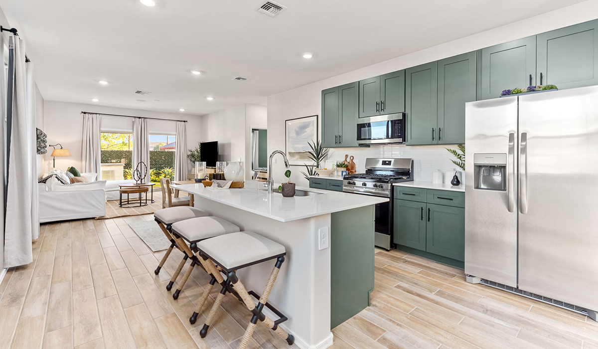 Introducing the Carolina — a thoughtfully designed single-story home offering 1,608 sq. ft. of modern comfort at Entrada Del Toro, a master-planned community in Rancho Sahuarita.  With three bedrooms, two full bathrooms, and a two-car garage, this efficient and beautifully planned layout is perfect for those seeking convenience, comfort, and single-level living.  A welcoming front porch invites you inside, where the entryway opens into a bright and beautifully crafted living space. The heart of the home is the well-appointed kitchen, featuring a large center island, walk-in pantry, and stylish Shaker-style cabinetry. Overlooking the dining area and great room, this open layout makes it easy to cook, gather, and entertain with ease.  The primary bedroom is thoughtfully positioned at the rear of the home, creating a private retreat. Complete with a large en-suite bathroom and walk-in closet, it’s designed for relaxation and convenience.  Two additional bedrooms are located toward the front of the home, offering flexibility for family, guests, a home office, or hobbies, and share a full secondary hallway bathroom.  Our homes at Entrada Del Toro are designed with the future in mind. Each home features a light lace stucco exterior, landscaped front yards with auto drip irrigation, and large backyards that are fully fenced and ready for your personal touch. Inside, the Home is Connected® Smart Home package brings modern convenience to your fingertips with a smart thermostat, video doorbell, keyless entry, and a Wi-Fi® enabled garage door opener.  With its smart layout, modern features, and effortless single-story living, the Carolina brings comfort and functionality together in a one beautifully designed home here at Entrada Del Toro.  Residents of Entrada Del Toro will enjoy access to Rancho Sahuarita’s extensive amenity offerings, which include a full-service fitness center, multiple large swimming pools, pickle-ball courts, splash pads, playgrounds, and sizable parks and recreational spaces designed for all ages and lifestyles. In addition, homeowners will have exclusive access to the brand-new Entrada Del Toro Community Center, scheduled to open Spring 2026, further enhancing the neighborhood experience with modern gathering and recreational spaces close to home.