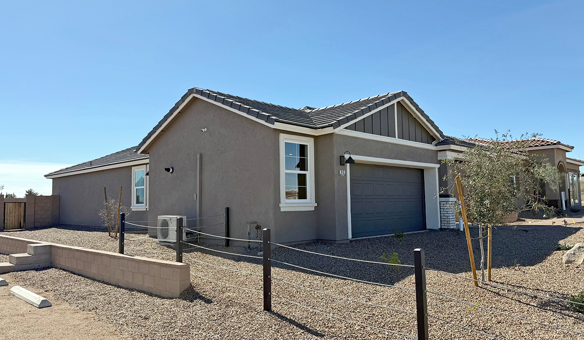 Introducing the Carolina — a thoughtfully designed single-story home offering 1,608 sq. ft. of modern comfort at Entrada Del Toro, a master-planned community in Rancho Sahuarita.  With three bedrooms, two full bathrooms, and a two-car garage, this efficient and beautifully planned layout is perfect for those seeking convenience, comfort, and single-level living.  A welcoming front porch invites you inside, where the entryway opens into a bright and beautifully crafted living space. The heart of the home is the well-appointed kitchen, featuring a large center island, walk-in pantry, and stylish Shaker-style cabinetry. Overlooking the dining area and great room, this open layout makes it easy to cook, gather, and entertain with ease.  The primary bedroom is thoughtfully positioned at the rear of the home, creating a private retreat. Complete with a large en-suite bathroom and walk-in closet, it’s designed for relaxation and convenience.  Two additional bedrooms are located toward the front of the home, offering flexibility for family, guests, a home office, or hobbies, and share a full secondary hallway bathroom.  Our homes at Entrada Del Toro are designed with the future in mind. Each home features a light lace stucco exterior, landscaped front yards with auto drip irrigation, and large backyards that are fully fenced and ready for your personal touch. Inside, the Home is Connected® Smart Home package brings modern convenience to your fingertips with a smart thermostat, video doorbell, keyless entry, and a Wi-Fi® enabled garage door opener.  With its smart layout, modern features, and effortless single-story living, the Carolina brings comfort and functionality together in a one beautifully designed home here at Entrada Del Toro.  Residents of Entrada Del Toro will enjoy access to Rancho Sahuarita’s extensive amenity offerings, which include a full-service fitness center, multiple large swimming pools, pickle-ball courts, splash pads, playgrounds, and sizable parks and recreational spaces designed for all ages and lifestyles. In addition, homeowners will have exclusive access to the brand-new Entrada Del Toro Community Center, scheduled to open Spring 2026, further enhancing the neighborhood experience with modern gathering and recreational spaces close to home.