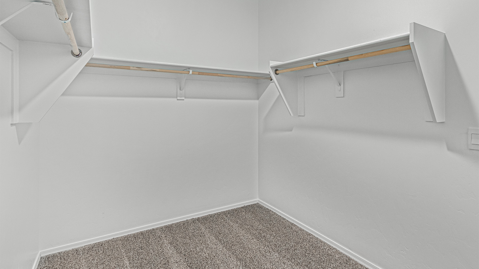 Introducing the Kingston at Entrada Del Toro  The Kingston is a spacious and thoughtfully designed single-story home located in the highly desirable Entrada Del Toro neighborhood within the master-planned community of Rancho Sahuarita. Offering 2,172 square feet of well-appointed living space, this inviting floor plan features four bedrooms, two full bathrooms, a grand kitchen island, a covered back patio, and a two-car garage—ideal for households seeking space, flexibility, and room to thrive.  From the moment you step inside, a welcoming entryway opens into an expansive open-concept layout that seamlessly connects the great room, dining area, and kitchen, creating a bright and airy space perfect for everyday living and effortless entertaining. The kitchen serves as the heart of the home, showcasing a large center island, Shaker-style cabinetry, quartz countertops, a walk-in pantry, and abundant storage for both function and style.  The Kingston features a well-planned split-bedroom design, with three secondary bedrooms located near the front of the home—ideal for family members, guests, home offices, or creative spaces. Privately situated at the rear of the home, the spacious primary suite offers a peaceful retreat complete with an en-suite bathroom and a generous walk-in closet.  *Images shown are for reference only. They depict the Kingston model home and may not represent the actual home.  Homes at Entrada Del Toro are designed with the future in mind. Exterior features include a light lace stucco finish, professionally landscaped front yards with automatic drip irrigation, and large, fully fenced backyards ready for your personal touch. Inside, the Home is Connected® Smart Home package provides modern convenience with a smart thermostat, video doorbell, keyless entry, and a Wi-Fi®–enabled garage door opener.  With its expansive living areas, flexible bedroom arrangement, and thoughtful design throughout, the Kingston delivers the perfect balance of comfort, convenience, and livability.  Residents of Entrada Del Toro enjoy access to Rancho Sahuarita’s extensive amenities, including a full-service fitness center, multiple resort-style swimming pools, pickleball courts, splash pads, playgrounds, and expansive parks designed for all ages and lifestyles. Homeowners will also enjoy exclusive access to the brand-new Entrada Del Toro Community Center, scheduled to open in Spring 2026, featuring modern gathering spaces and recreational amenities just moments from home.