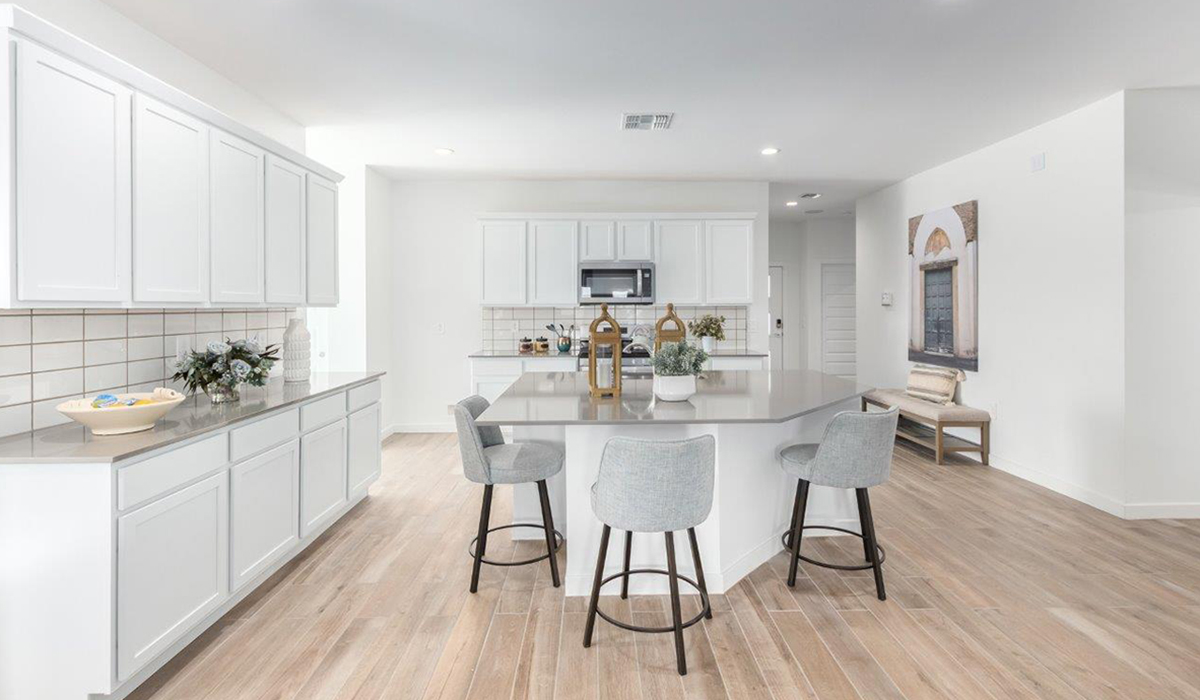 Introducing the Kingston at Entrada Del Toro  The Kingston is a spacious and thoughtfully designed single-story home located in the highly desirable Entrada Del Toro neighborhood within the master-planned community of Rancho Sahuarita. Offering 2,172 square feet of well-appointed living space, this inviting floor plan features four bedrooms, two full bathrooms, a grand kitchen island, a covered back patio, and a two-car garage—ideal for households seeking space, flexibility, and room to thrive.  From the moment you step inside, a welcoming entryway opens into an expansive open-concept layout that seamlessly connects the great room, dining area, and kitchen, creating a bright and airy space perfect for everyday living and effortless entertaining. The kitchen serves as the heart of the home, showcasing a large center island, Shaker-style cabinetry, quartz countertops, a walk-in pantry, and abundant storage for both function and style.  The Kingston features a well-planned split-bedroom design, with three secondary bedrooms located near the front of the home—ideal for family members, guests, home offices, or creative spaces. Privately situated at the rear of the home, the spacious primary suite offers a peaceful retreat complete with an en-suite bathroom and a generous walk-in closet.  *Images shown are for reference only. They depict the Kingston model home and may not represent the actual home.  Homes at Entrada Del Toro are designed with the future in mind. Exterior features include a light lace stucco finish, professionally landscaped front yards with automatic drip irrigation, and large, fully fenced backyards ready for your personal touch. Inside, the Home is Connected® Smart Home package provides modern convenience with a smart thermostat, video doorbell, keyless entry, and a Wi-Fi®–enabled garage door opener.  With its expansive living areas, flexible bedroom arrangement, and thoughtful design throughout, the Kingston delivers the perfect balance of comfort, convenience, and livability.  Residents of Entrada Del Toro enjoy access to Rancho Sahuarita’s extensive amenities, including a full-service fitness center, multiple resort-style swimming pools, pickleball courts, splash pads, playgrounds, and expansive parks designed for all ages and lifestyles. Homeowners will also enjoy exclusive access to the brand-new Entrada Del Toro Community Center, scheduled to open in Spring 2026, featuring modern gathering spaces and recreational amenities just moments from home.  *Images shown are for reference only. They depict The Kingston model home and may not represent the actual home.