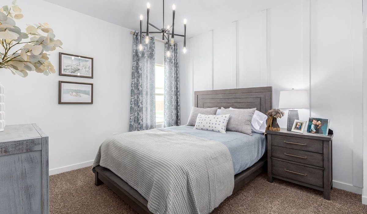 Introducing the Kingston at Entrada Del Toro  The Kingston is a spacious and thoughtfully designed single-story home located in the highly desirable Entrada Del Toro neighborhood within the master-planned community of Rancho Sahuarita. Offering 2,172 square feet of well-appointed living space, this inviting floor plan features four bedrooms, two full bathrooms, a grand kitchen island, a covered back patio, and a two-car garage—ideal for households seeking space, flexibility, and room to thrive.  From the moment you step inside, a welcoming entryway opens into an expansive open-concept layout that seamlessly connects the great room, dining area, and kitchen, creating a bright and airy space perfect for everyday living and effortless entertaining. The kitchen serves as the heart of the home, showcasing a large center island, Shaker-style cabinetry, quartz countertops, a walk-in pantry, and abundant storage for both function and style.  The Kingston features a well-planned split-bedroom design, with three secondary bedrooms located near the front of the home—ideal for family members, guests, home offices, or creative spaces. Privately situated at the rear of the home, the spacious primary suite offers a peaceful retreat complete with an en-suite bathroom and a generous walk-in closet.  *Images shown are for reference only. They depict the Kingston model home and may not represent the actual home.  Homes at Entrada Del Toro are designed with the future in mind. Exterior features include a light lace stucco finish, professionally landscaped front yards with automatic drip irrigation, and large, fully fenced backyards ready for your personal touch. Inside, the Home is Connected® Smart Home package provides modern convenience with a smart thermostat, video doorbell, keyless entry, and a Wi-Fi®–enabled garage door opener.  With its expansive living areas, flexible bedroom arrangement, and thoughtful design throughout, the Kingston delivers the perfect balance of comfort, convenience, and livability.  Residents of Entrada Del Toro enjoy access to Rancho Sahuarita’s extensive amenities, including a full-service fitness center, multiple resort-style swimming pools, pickleball courts, splash pads, playgrounds, and expansive parks designed for all ages and lifestyles. Homeowners will also enjoy exclusive access to the brand-new Entrada Del Toro Community Center, scheduled to open in Spring 2026, featuring modern gathering spaces and recreational amenities just moments from home.  *Images shown are for reference only. They depict The Kingston model home and may not represent the actual home.