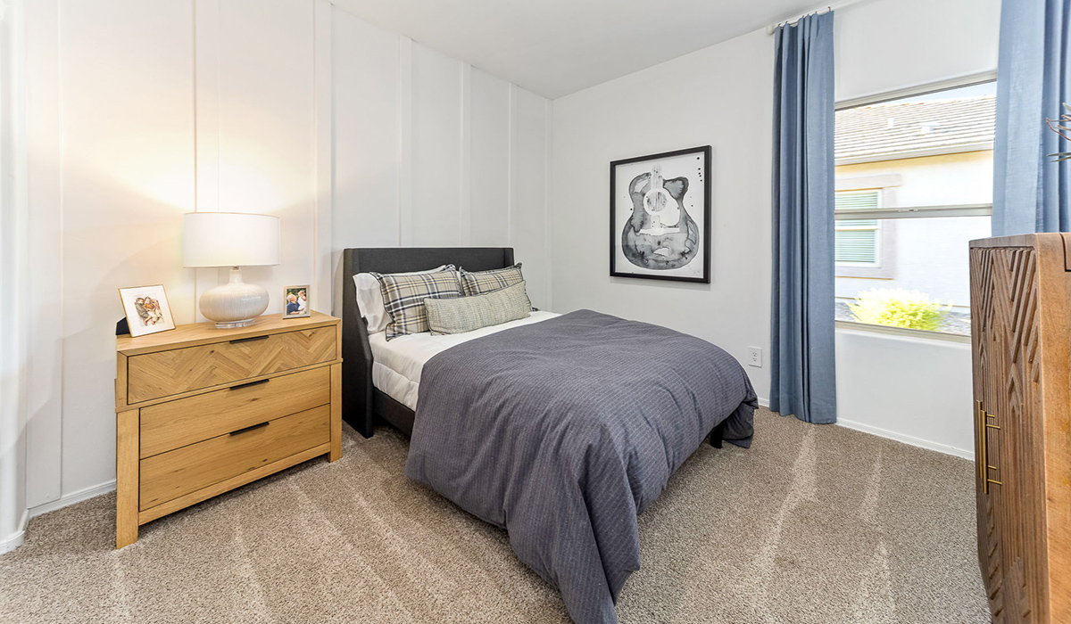 Introducing the Kingston at Entrada Del Toro  The Kingston is a spacious and thoughtfully designed single-story home located in the highly desirable Entrada Del Toro neighborhood within the master-planned community of Rancho Sahuarita. Offering 2,172 square feet of well-appointed living space, this inviting floor plan features four bedrooms, two full bathrooms, a grand kitchen island, a covered back patio, and a two-car garage—ideal for households seeking space, flexibility, and room to thrive.  From the moment you step inside, a welcoming entryway opens into an expansive open-concept layout that seamlessly connects the great room, dining area, and kitchen, creating a bright and airy space perfect for everyday living and effortless entertaining. The kitchen serves as the heart of the home, showcasing a large center island, Shaker-style cabinetry, quartz countertops, a walk-in pantry, and abundant storage for both function and style.  The Kingston features a well-planned split-bedroom design, with three secondary bedrooms located near the front of the home—ideal for family members, guests, home offices, or creative spaces. Privately situated at the rear of the home, the spacious primary suite offers a peaceful retreat complete with an en-suite bathroom and a generous walk-in closet.  *Images shown are for reference only. They depict the Kingston model home and may not represent the actual home.  Homes at Entrada Del Toro are designed with the future in mind. Exterior features include a light lace stucco finish, professionally landscaped front yards with automatic drip irrigation, and large, fully fenced backyards ready for your personal touch. Inside, the Home is Connected® Smart Home package provides modern convenience with a smart thermostat, video doorbell, keyless entry, and a Wi-Fi®–enabled garage door opener.  With its expansive living areas, flexible bedroom arrangement, and thoughtful design throughout, the Kingston delivers the perfect balance of comfort, convenience, and livability.  Residents of Entrada Del Toro enjoy access to Rancho Sahuarita’s extensive amenities, including a full-service fitness center, multiple resort-style swimming pools, pickleball courts, splash pads, playgrounds, and expansive parks designed for all ages and lifestyles. Homeowners will also enjoy exclusive access to the brand-new Entrada Del Toro Community Center, scheduled to open in Spring 2026, featuring modern gathering spaces and recreational amenities just moments from home.  *Images shown are for reference only. They depict the Kingston model home and may not represent the actual home.