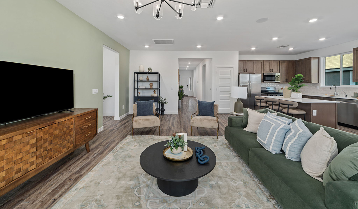 Introducing the Mariposa at Entrada Del Toro, a stunning single-story home within the master-planned community of Rancho Sahuarita.  This spacious and inviting home offers 1,897 sq. ft., four bedrooms, three full bathrooms, covered back patio, and two-car garage. This impressive layout is ideal for large households, multigenerational living, or anyone who simply wants room to grow, gather, and live comfortably.  A welcoming front porch leads you into the entryway, which flows into the expansive open-concept great room, dining area, and kitchen. The kitchen features a large center island, Shaker-style cabinetry, and plenty of storage space. With thoughtful design and abundant natural light this home welcoming.  One of the standout features of the Mariposa is the second bedroom that features an en-suite bathroom, perfect for multi-generational living, young adult, or a guest-style suite.  Our homes at Entrada Del Toro are designed with the future in mind. Each home features a light lace stucco exterior, landscaped front yards with auto drip irrigation, and large backyards that are fully fenced and ready for your personal touch. Inside, the Home is Connected® Smart Home package brings modern convenience to your fingertips with a smart thermostat, video doorbell, keyless entry, and a Wi-Fi® enabled garage door opener.  With its expansive living spaces, flexible bedroom arrangements, and thoughtful deign throughout, the Mariposa offers the ultimate combination of comfort, convenience, and room to thrive.  Residents of Entrada Del Toro will enjoy access to Rancho Sahuarita’s extensive amenity offerings, which include a full-service fitness center, multiple large swimming pools, pickle-ball courts, splash pads, playgrounds, and sizable parks and recreational spaces designed for all ages and lifestyles. In addition, homeowners will have exclusive access to the brand-new Entrada Del Toro Community Center, scheduled to open Spring 2026, further enhancing the neighborhood experience with modern gathering and recreational spaces close to home.  *Images shown are for reference only. They depict The Mariposa sales model home and may not represent the actual home.
