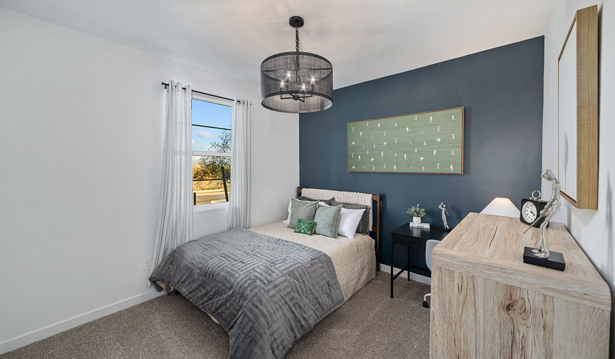 Introducing the Mariposa at Entrada Del Toro, a stunning single-story home within the master-planned community of Rancho Sahuarita.  This spacious and inviting home offers 1,897 sq. ft., four bedrooms, three full bathrooms, covered back patio, and two-car garage. This impressive layout is ideal for large households, multigenerational living, or anyone who simply wants room to grow, gather, and live comfortably.  A welcoming front porch leads you into the entryway, which flows into the expansive open-concept great room, dining area, and kitchen. The kitchen features a large center island, Shaker-style cabinetry, and plenty of storage space. With thoughtful design and abundant natural light this home welcoming.  One of the standout features of the Mariposa is the second bedroom that features an en-suite bathroom, perfect for multi-generational living, young adult, or a guest-style suite.  Our homes at Entrada Del Toro are designed with the future in mind. Each home features a light lace stucco exterior, landscaped front yards with auto drip irrigation, and large backyards that are fully fenced and ready for your personal touch. Inside, the Home is Connected® Smart Home package brings modern convenience to your fingertips with a smart thermostat, video doorbell, keyless entry, and a Wi-Fi® enabled garage door opener.  With its expansive living spaces, flexible bedroom arrangements, and thoughtful deign throughout, the Mariposa offers the ultimate combination of comfort, convenience, and room to thrive.  Residents of Entrada Del Toro will enjoy access to Rancho Sahuarita’s extensive amenity offerings, which include a full-service fitness center, multiple large swimming pools, pickle-ball courts, splash pads, playgrounds, and sizable parks and recreational spaces designed for all ages and lifestyles. In addition, homeowners will have exclusive access to the brand-new Entrada Del Toro Community Center, scheduled to open Spring 2026, further enhancing the neighborhood experience with modern gathering and recreational spaces close to home.  *Images shown are for reference only. They depict The Mariposa sales model home and may not represent the actual home.